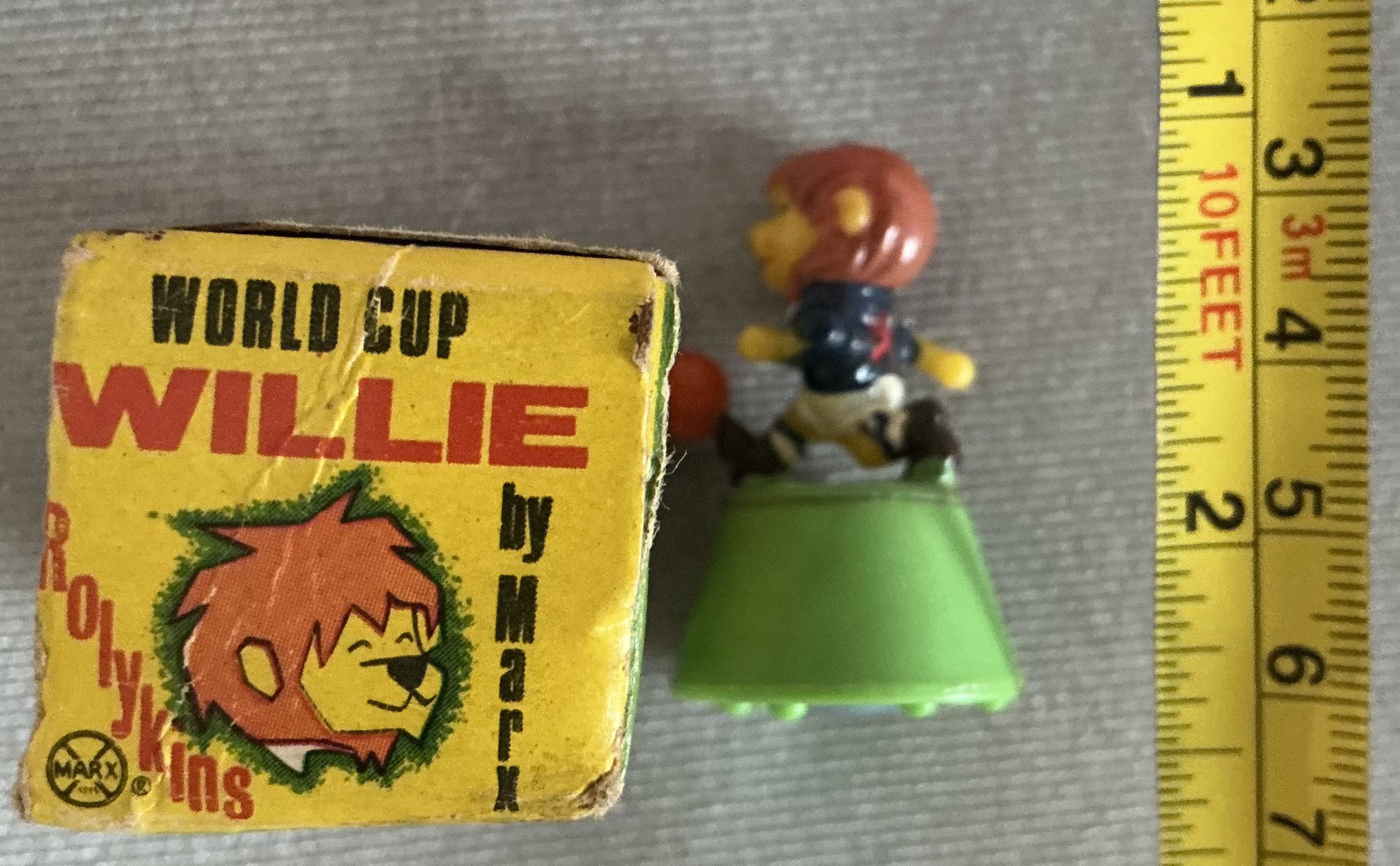 1966 World Cup Boxed World Cup Willie Figure: Rolykins 1.5 inch WC Willie figure unusually in original box. Figure has ball at the bottom for sliding along. 