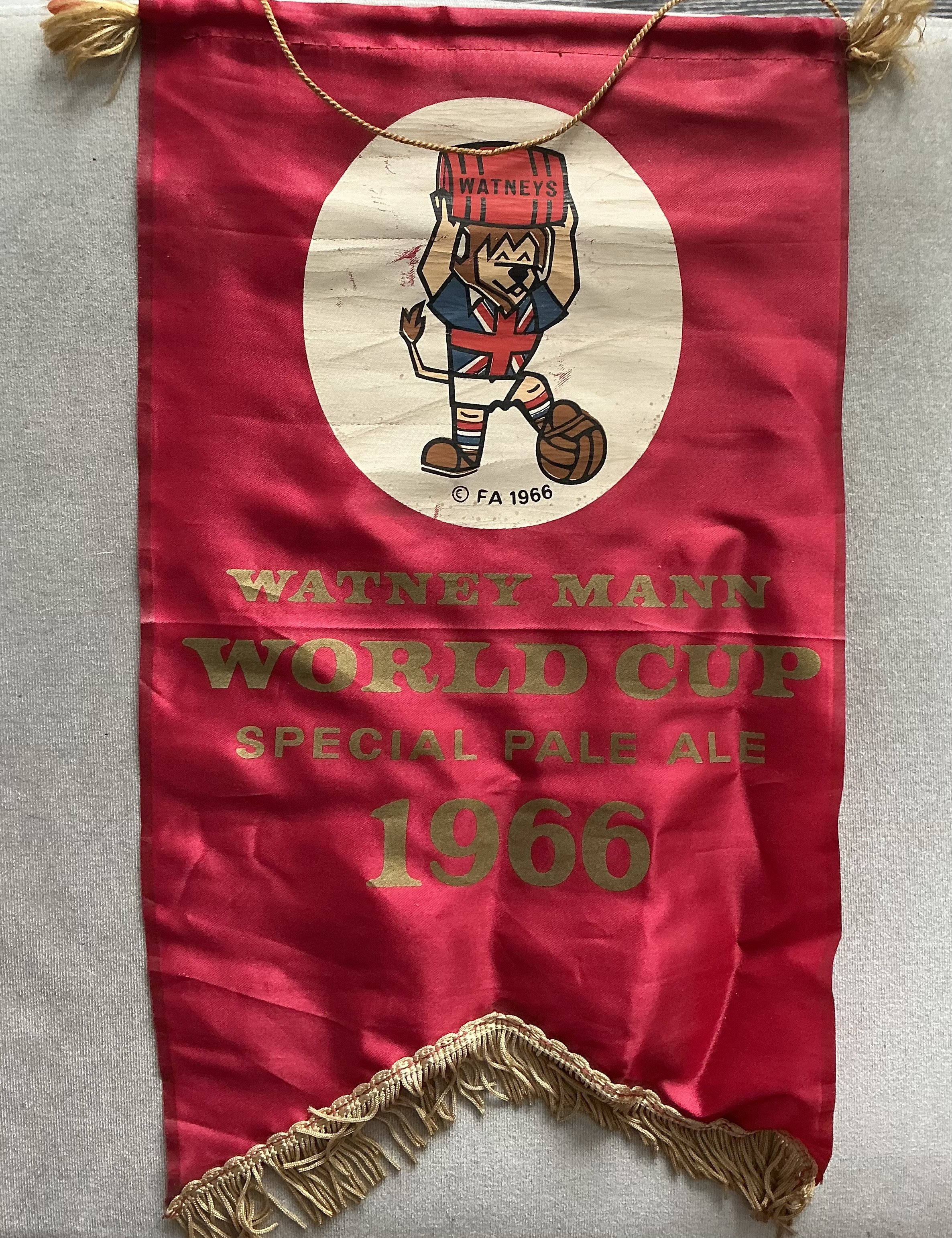 1966 World Cup Willie Watney Mann Pennant: Unusual to find in such excellent condition as they usually so signs of wear after 60 years. Measuring 16 inches high featuring WC Willie holding a barrel. Below are the words Watney Mann World Cup Special Pale Ale 1966. 