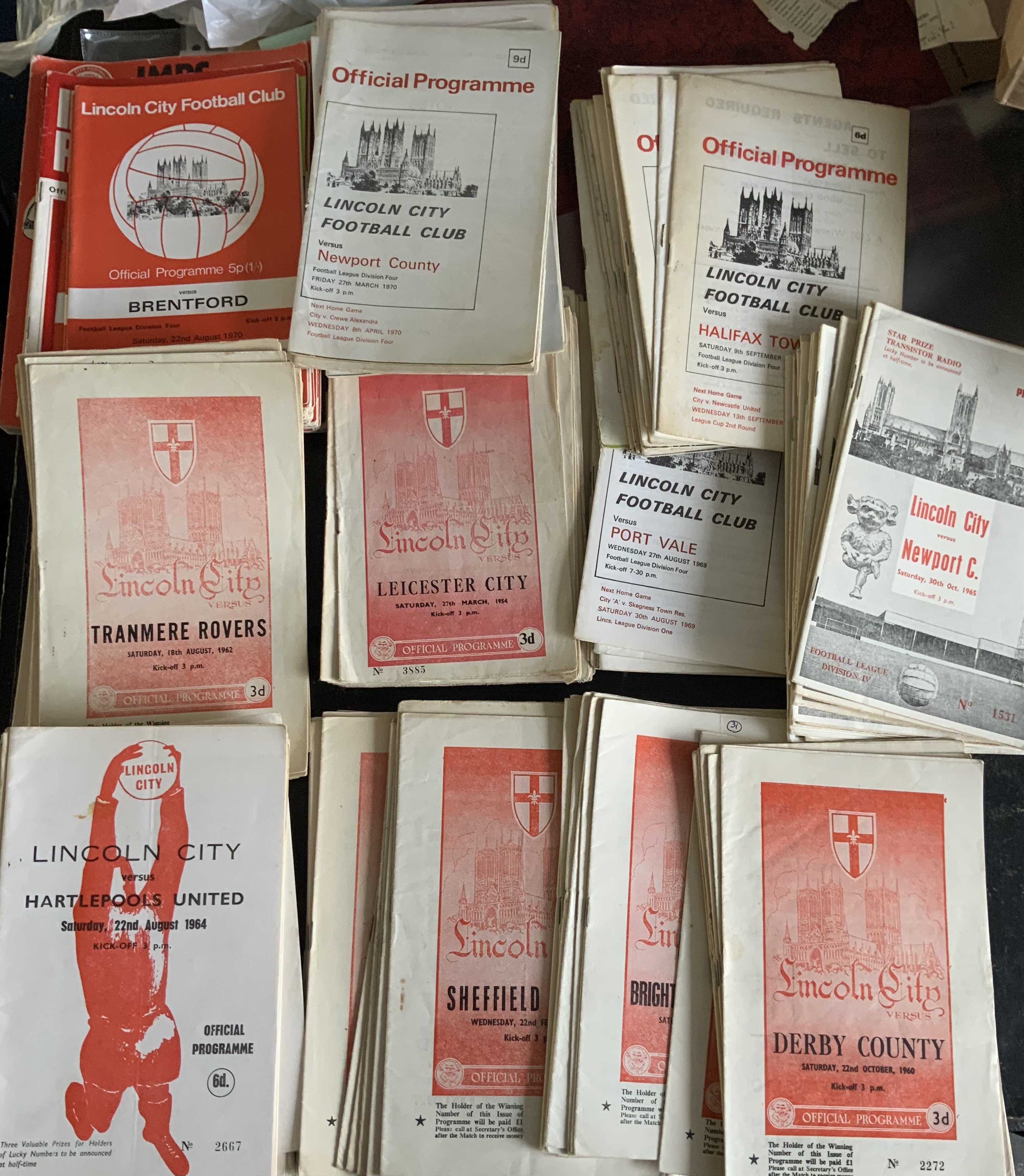 Lincoln City Home Football Programmes: 20 from mid to late 50s, Around 140 spanning the whole 60s decade to include League Cup matches v 62/63 Bury, 63/64 York, Hartlepool plus over 30 from the 70s. C/W 87/88 Championship complete homes in binder. Mainly very good with instructions to sell. (est 200)