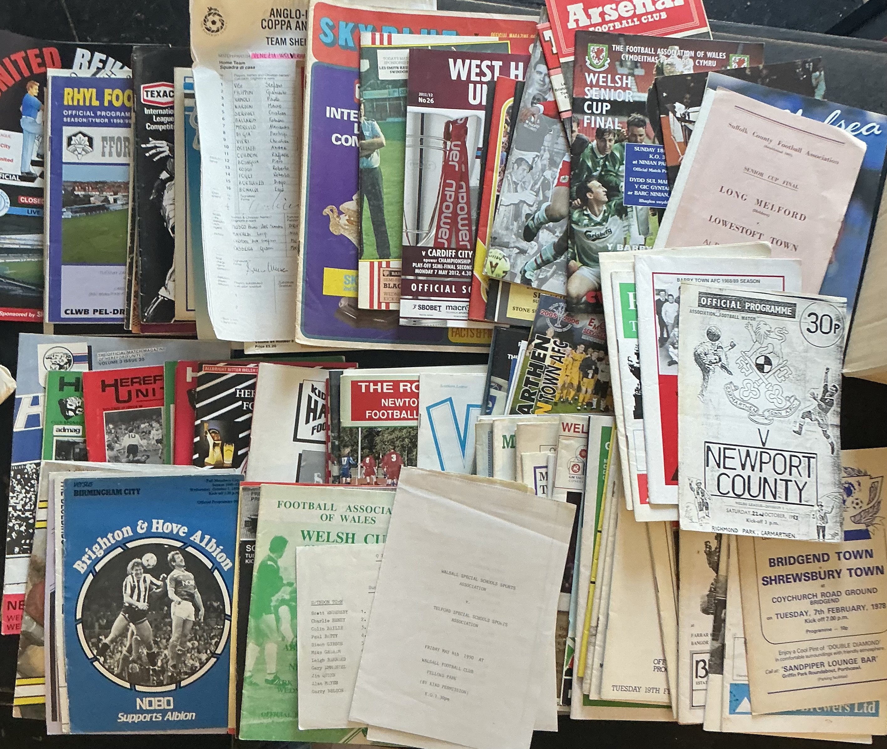 Welsh + Minor Cups Football Programmes: Welsh Cup makes up the majority of this lot though there are also Anglo/Italian from the early 1970s, Texaco Cup, County Cups plus cup replays on neutral grounds from the 1960s onwards. Interesting lot with instructions to sell. (170)
