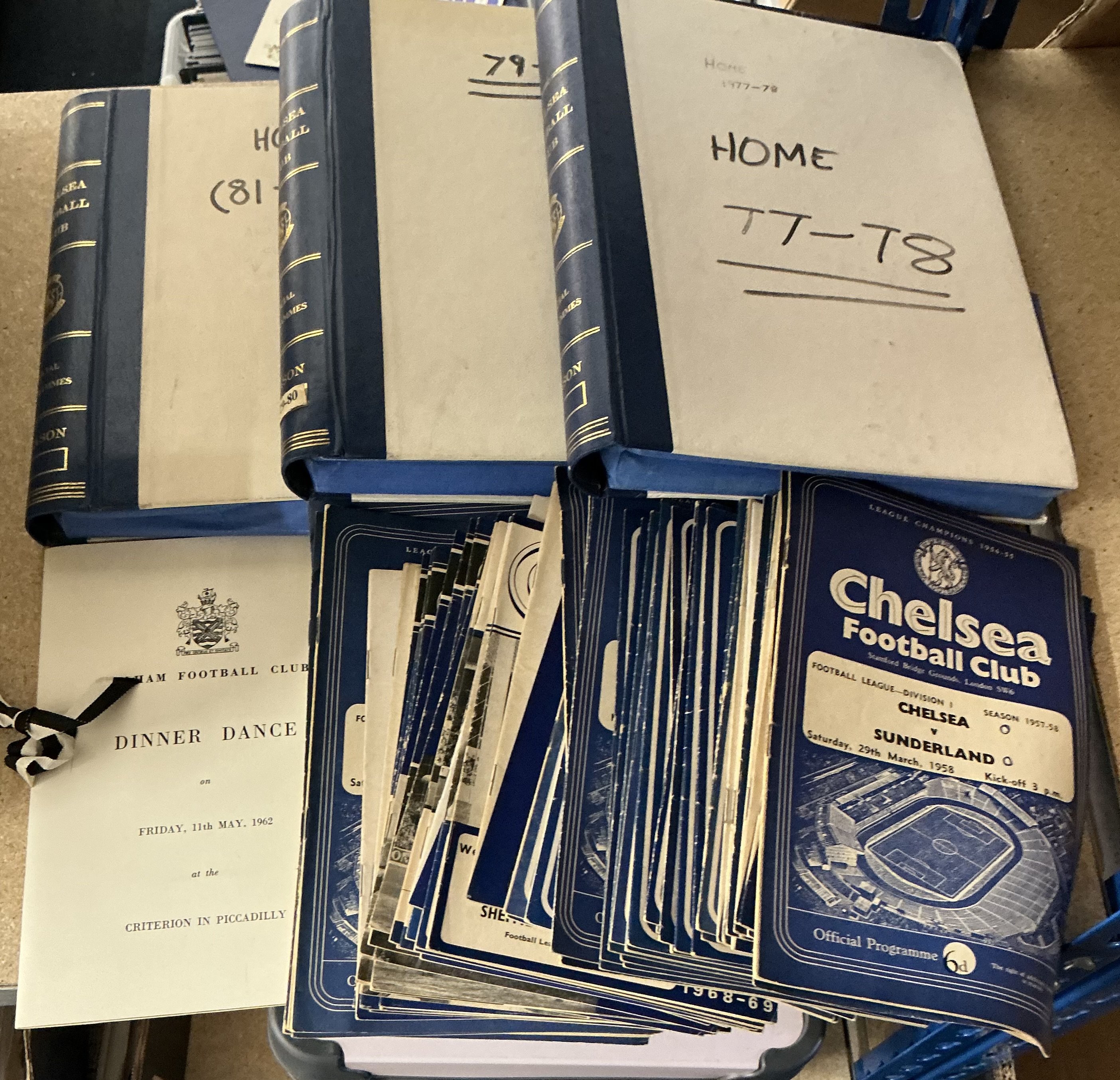 Chelsea Football Programmes: Quantity of mainly modern home programmes to include 3 home seasons with official binders. Includes about 50 programmes from the late 50s to mid 60s. Also includes a Fulham menu from 1962. Two boxes with instructions to sell. 