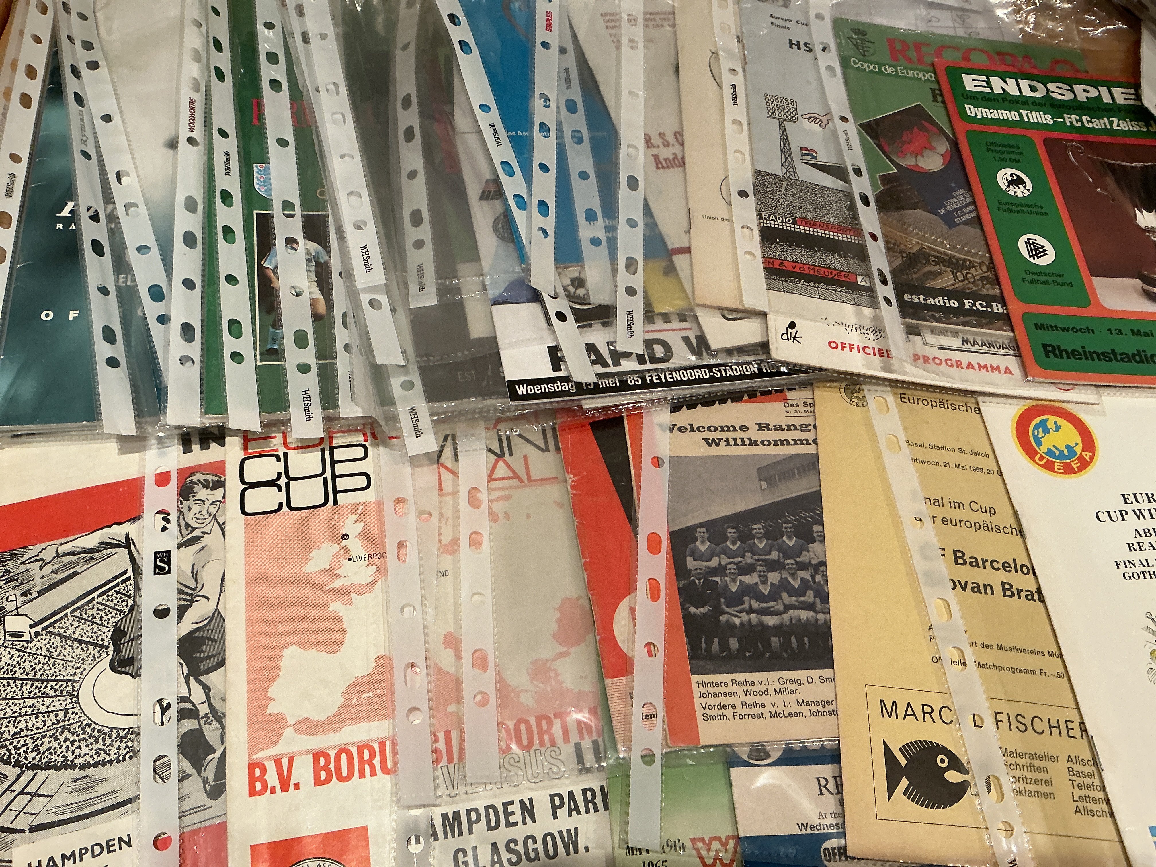 ECWC Final Football Programmes: From 1962 to 1999 in very good condition. Includes 1963 Athletico Madrid v Tottenham, 1964 Sporting club Portugal v Budapest, 1966 Dortmund v Liverpool, 1969 Barcelona v Bratislava, 1981 Tblisi v Jena, 1983 Aberdeen v Real Madrid. (28)