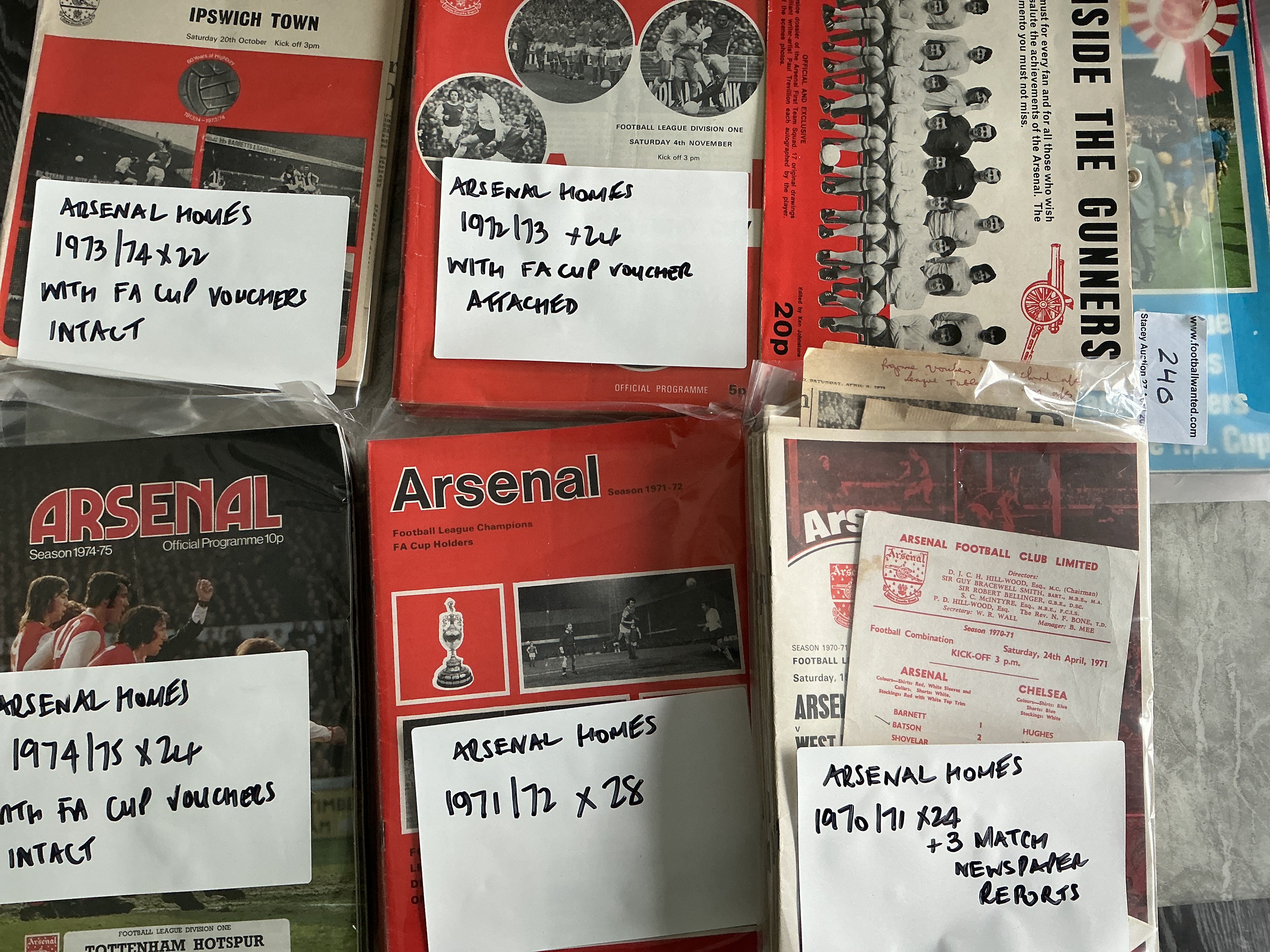 Arsenal Home Football Programmes: Nice collection which include match reports with programmes from 1949 to 1980. Most programmes have writing to cover with either score or attendance. Many seasons are complete. Comes with a programme binder, 44 handbooks and a few booklets. Instructions to sell. (4 small boxes)
