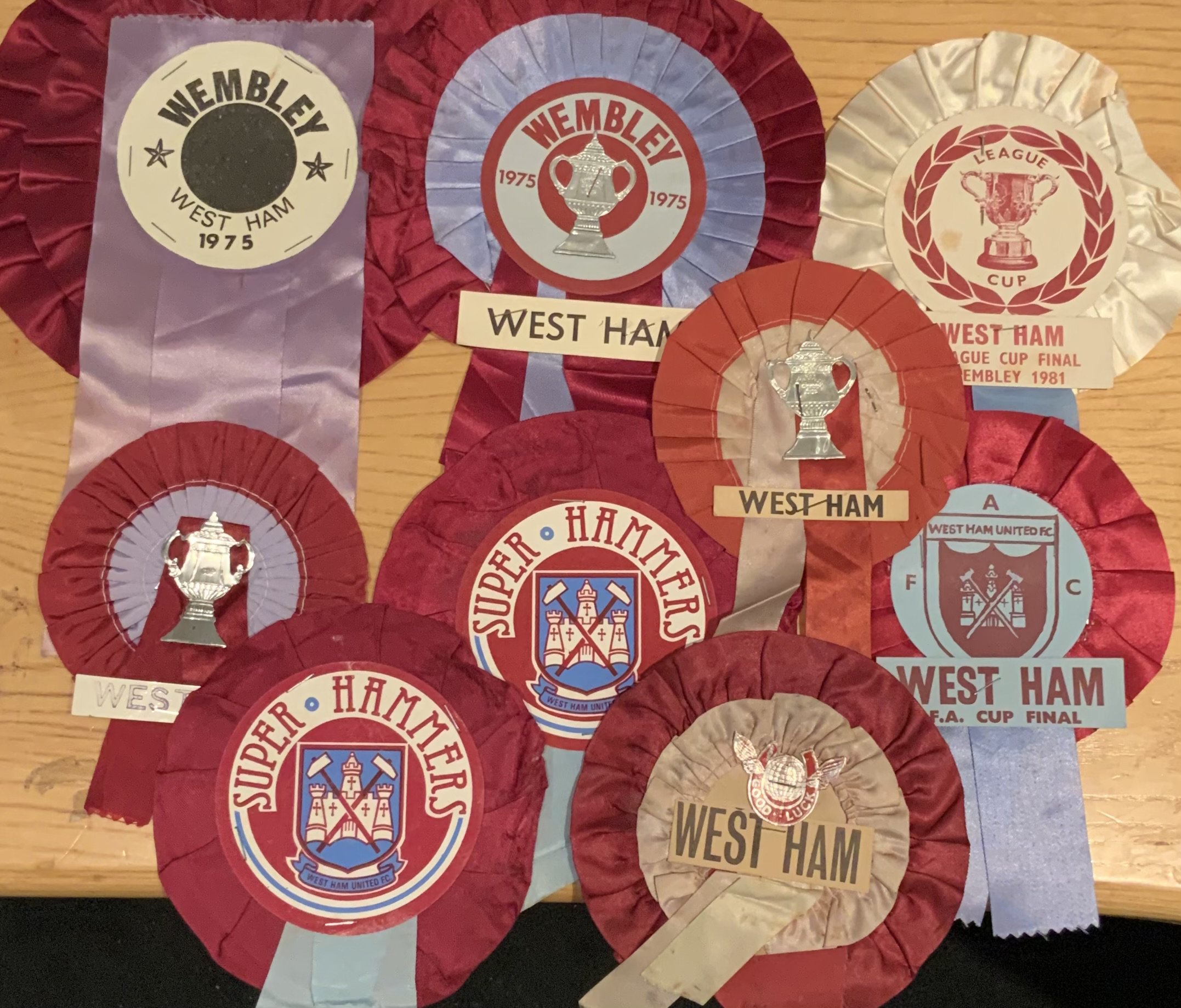 West Ham Football Rosettes: Nine  rosettes to include the 1975 FA cup final and the 1981 League Cup final. (9)
