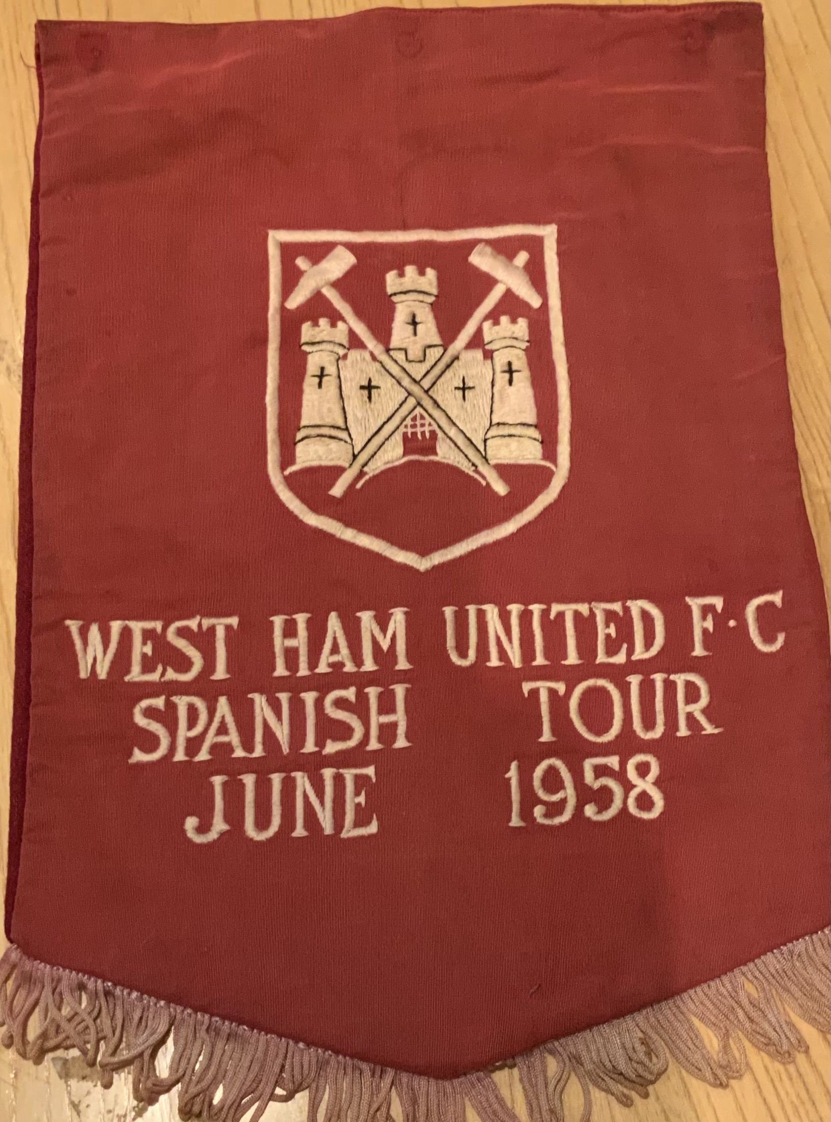 West Ham 1958 Football Pennant: Rare pennant intended for exchange on a Spanish tour in 1958. The tour was cancelled as the number of games to be played was reduced from four down to two. Pennant measures approximately 14x9 inches. 