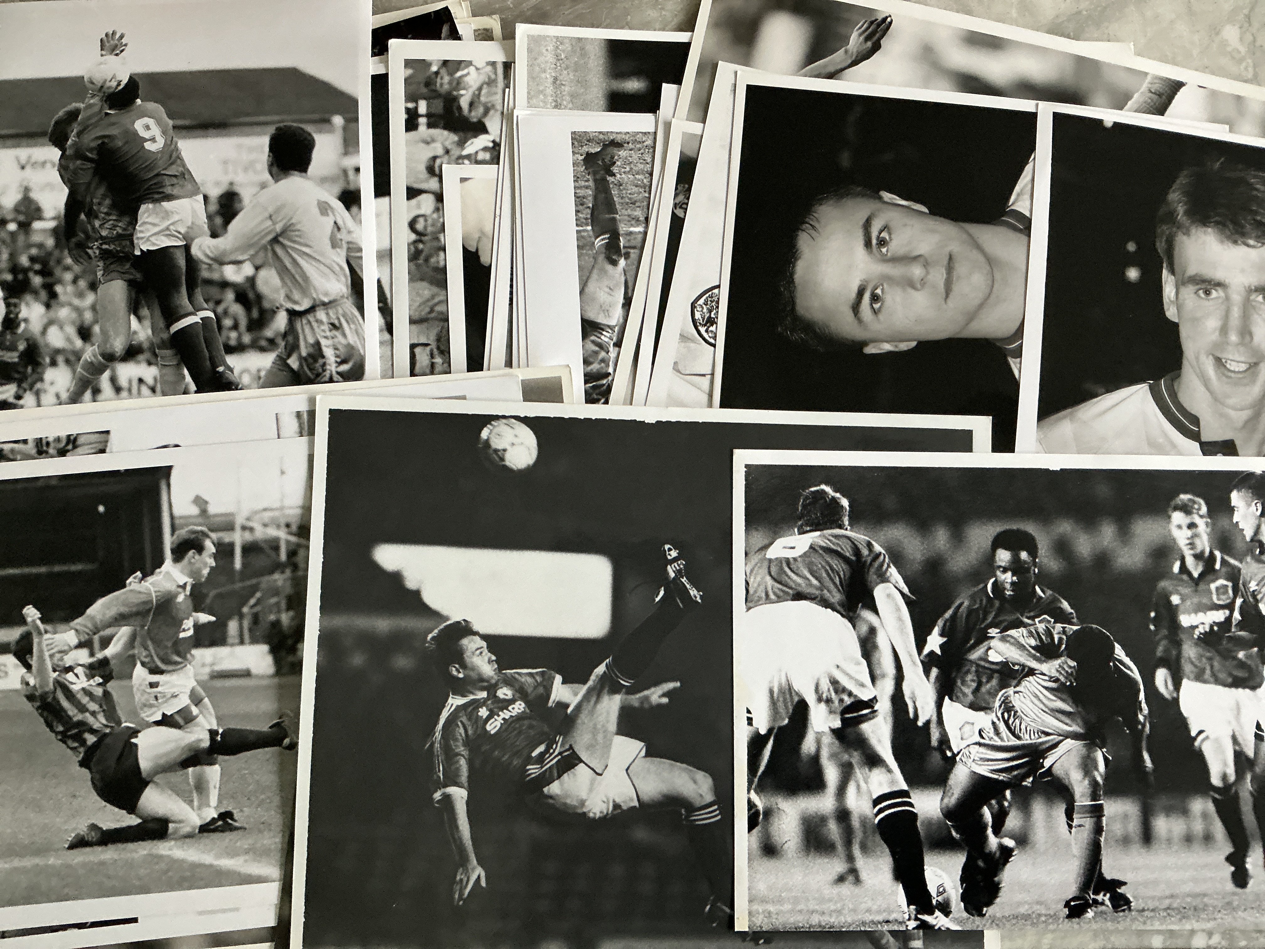 1990s Football Press Photos: Mainly early 90s which are black and white with plenty of match action in various sizes although mainly large. Mostly press stamps to rear. (190)