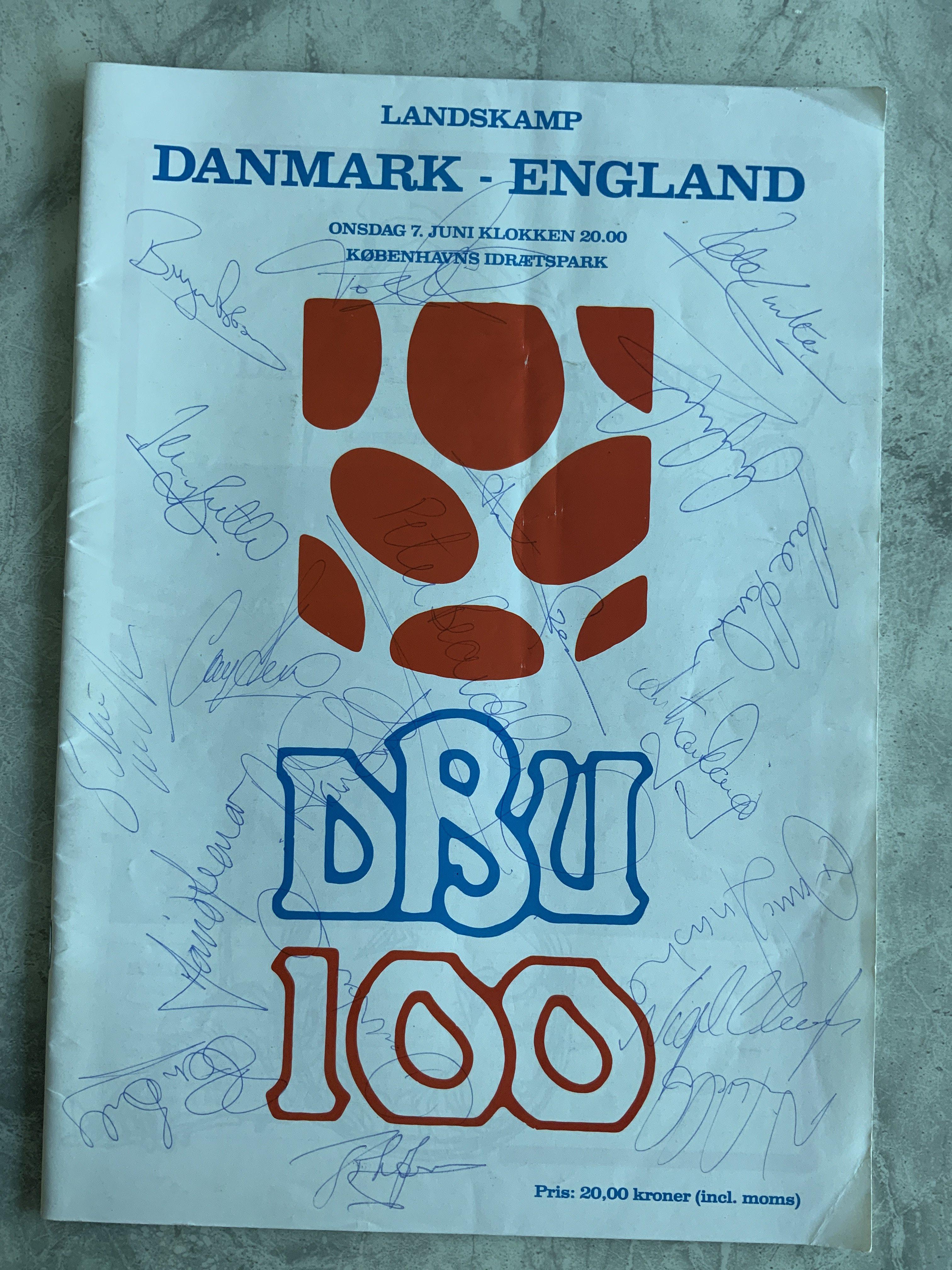 1989 England Away Signed Football Programmes: Front cover of Denmark programme is signed by 18 including Barnes Beardsley Rocastle Lineker Robson Seaman and Shilton. Scotland programme has been signed inside by 16 and is not quite as clear as the Denmark programme. (2)