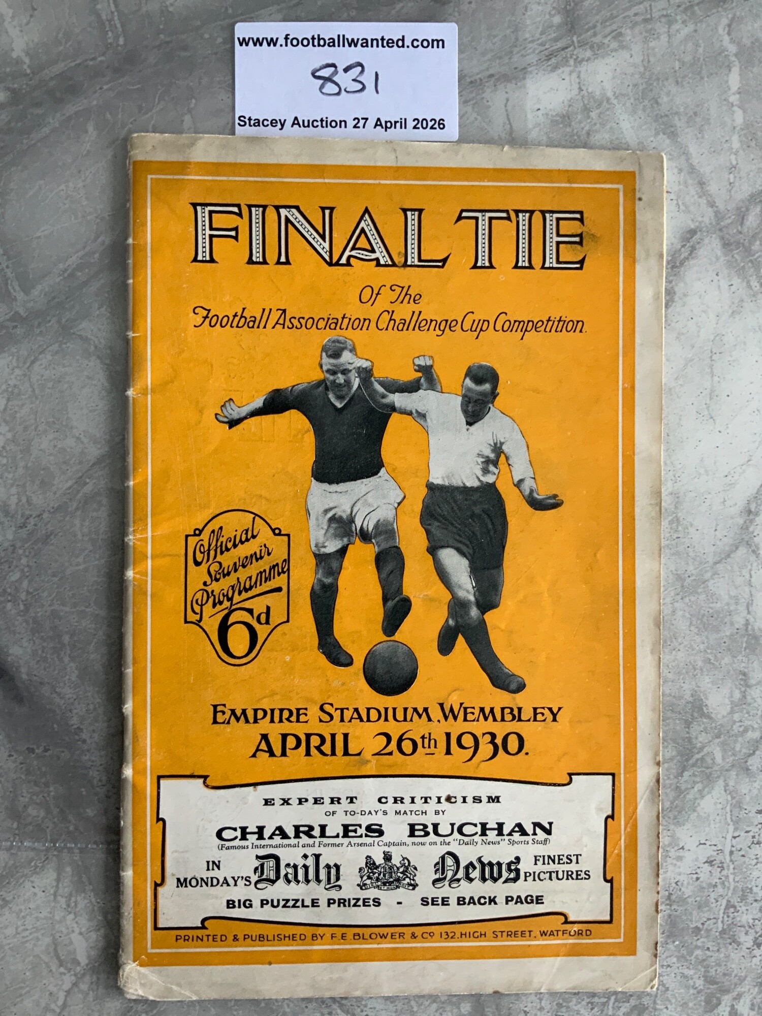 1930 FA Cup Final Football Programme + Song Sheet: Arsenal v Huddersfield programme in very good condition with no team changes. Daily Express song sheet is good with wear to one edge. (2)
