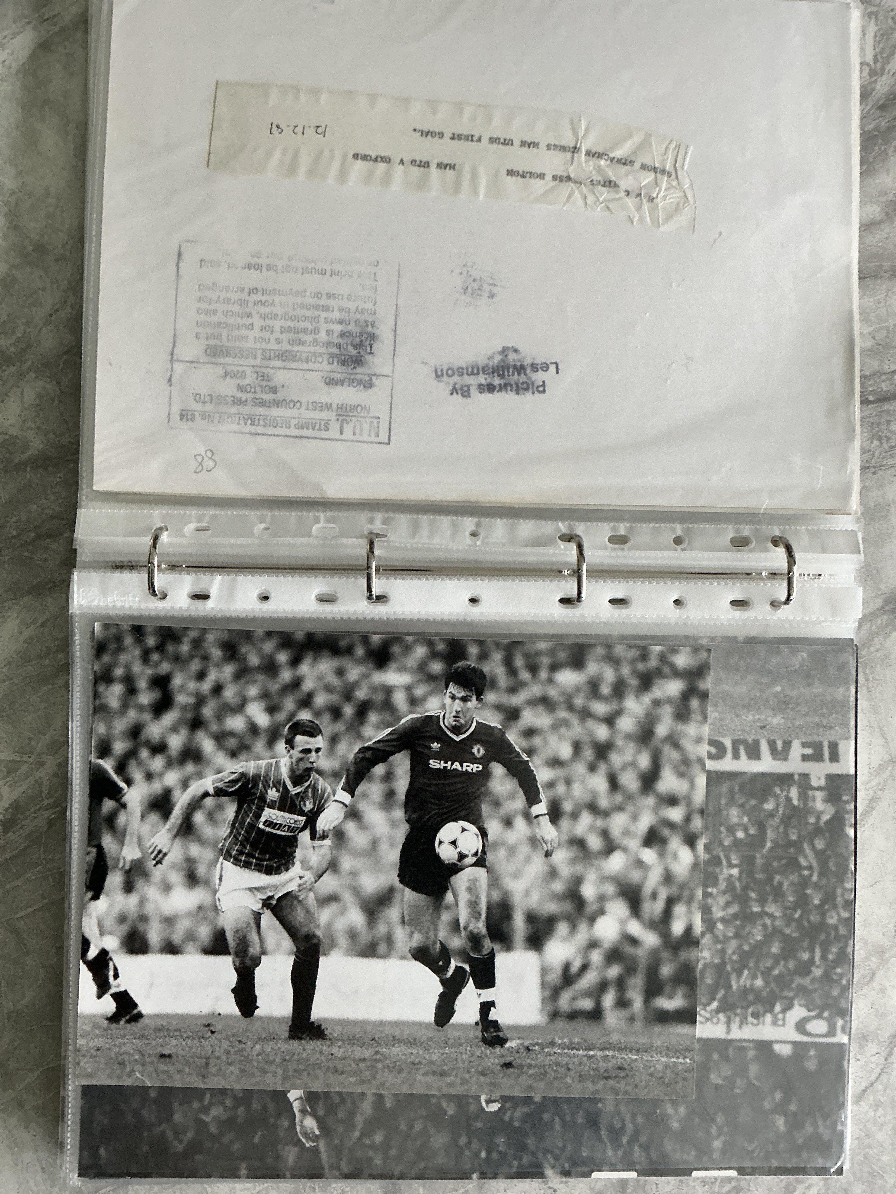 Manchester United 1980s Football Press Photos: Large black and white action photos with press stamps and often annotations to rear. Excellent. (50)