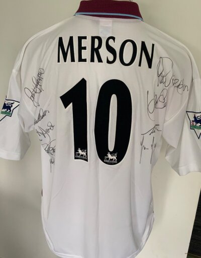 Aston Villa 1999. - 2000 Signed Match Worn Football Shirt: White away short sleeve with LDV Vans sponsorship and Premier League badging to arm. Number 10 Merson to rear. Signed to rear clearly by him and 9 team mates who were with him in the cup final team of 2000. Includes Southgate and  Joachim.