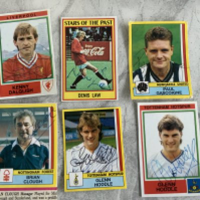 Signed Football Cards + Memorabilia: Previously stuck down cards signed by Dalglish Law Clough Gascoigne and Hoddle x 2, C/W some cut out attached cards and a couple of photos. 