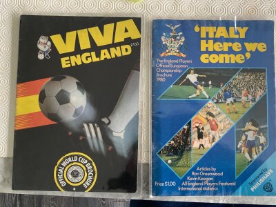 England Football Team Signed Brochures: 1982 brochure named Viva England signed inside on player profile picture by 12 including Anderson Devonshire Robson McDermott and Brooking. Euros 1980 brochure named Italy Here We Come signed inside by 10 on page devoted to each individual player. (2)