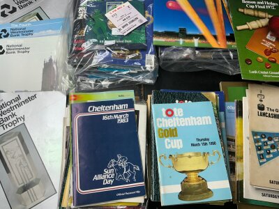 Sports Programmes Collection: Many Rugby programmes from the 2003 World Cup including a coin from the year England were victorious. Nearly 50 horse racing programmes often from the Cheltenham Gold Cup, Quantity of cricket programmes from the 60s onwards including some finals. Small amount of golf and boxing to include Muhammad Ali v Leon Spinks programme. (box)