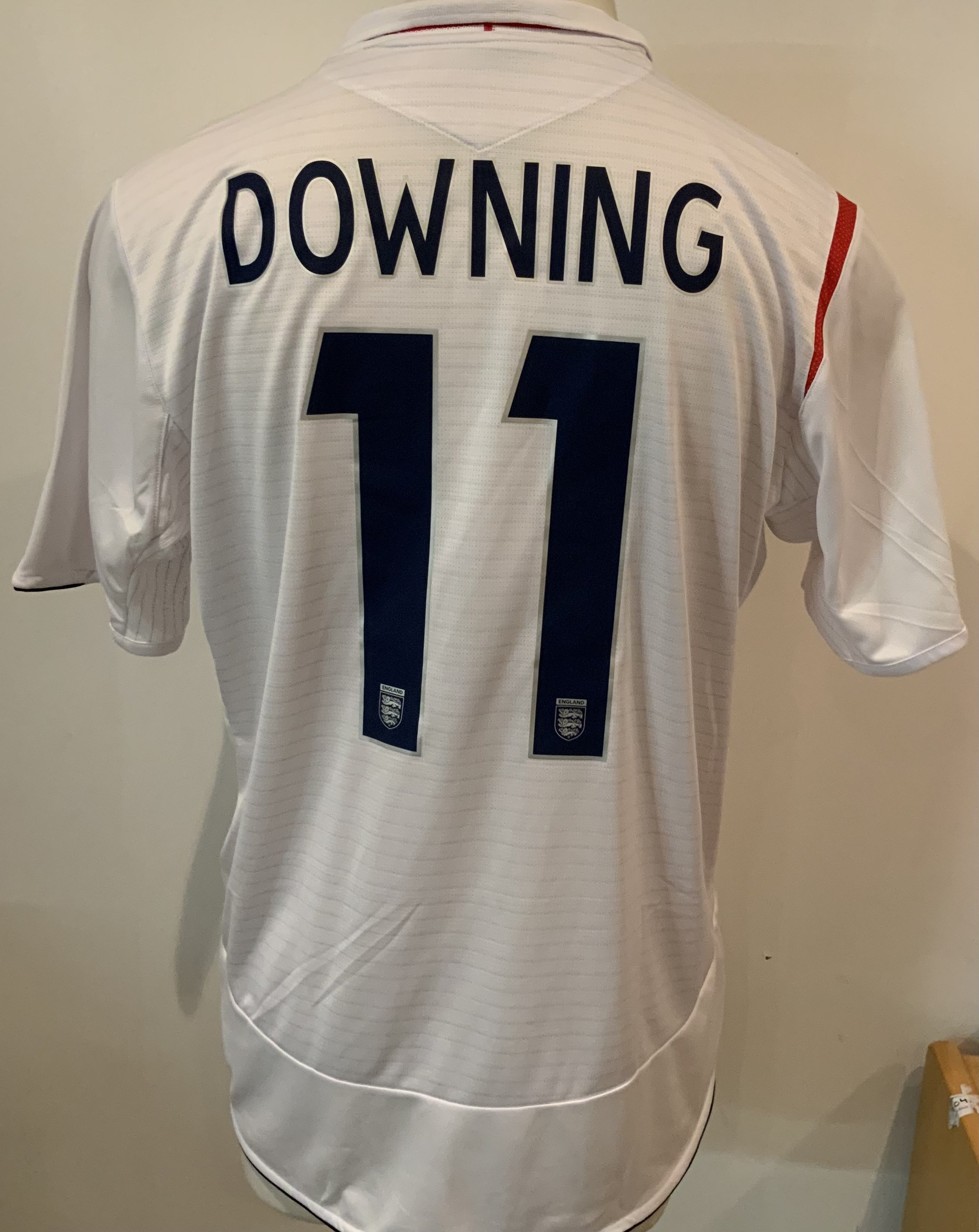 England 2006 Match Issued Home Football Shirt: Umbro short sleeve shirt with Downing 11 to rear and Euro 2008 badging to sleeve. Number 11 above match details England v Macedonia 07 10 2006. Direct from top source who we know.