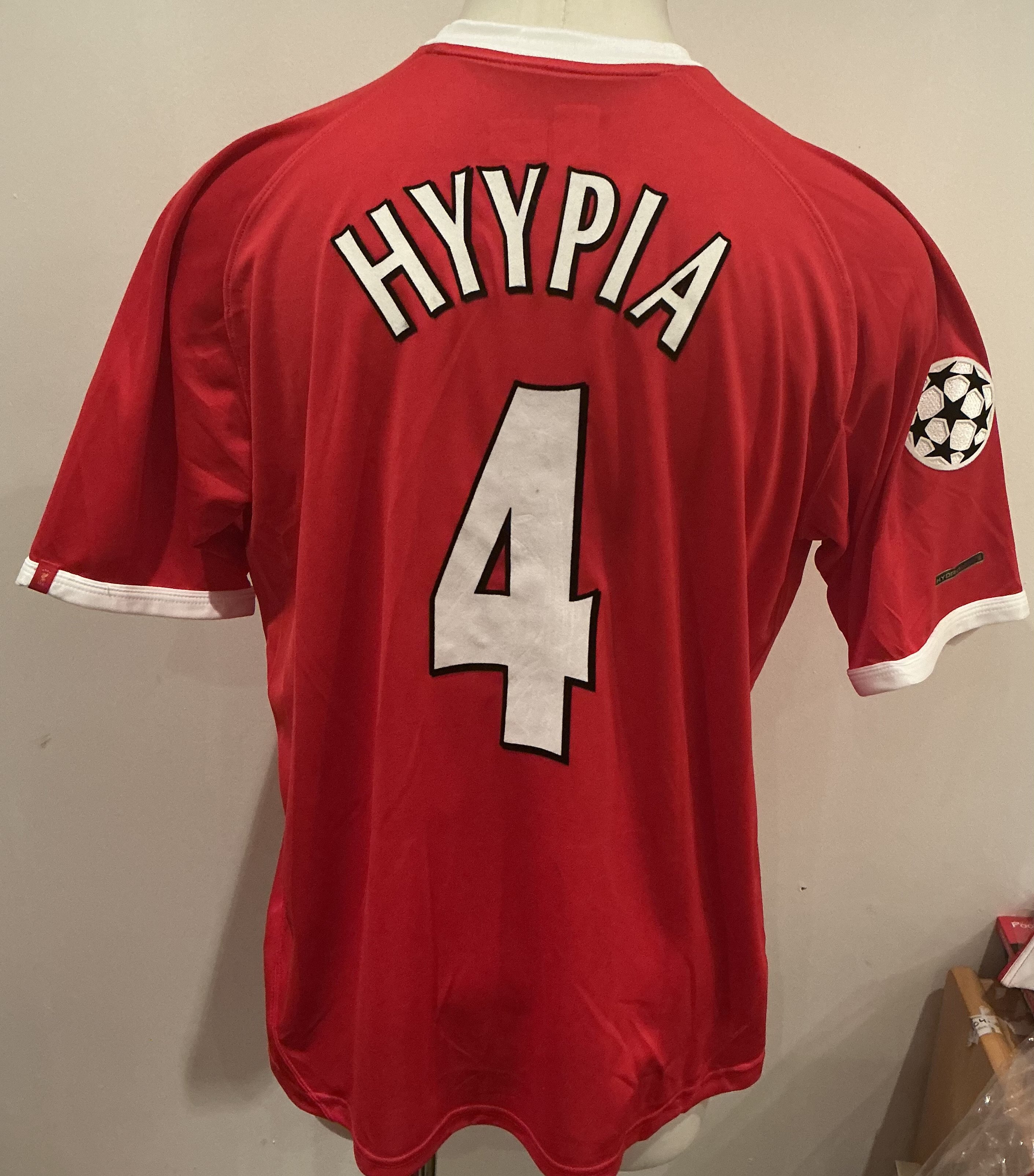 2001 - 2003 Liverpool Match Worn Champions League Shirt: Short sleeve red Number 4 with Hyypia to rear and Champions League badge to one arm.