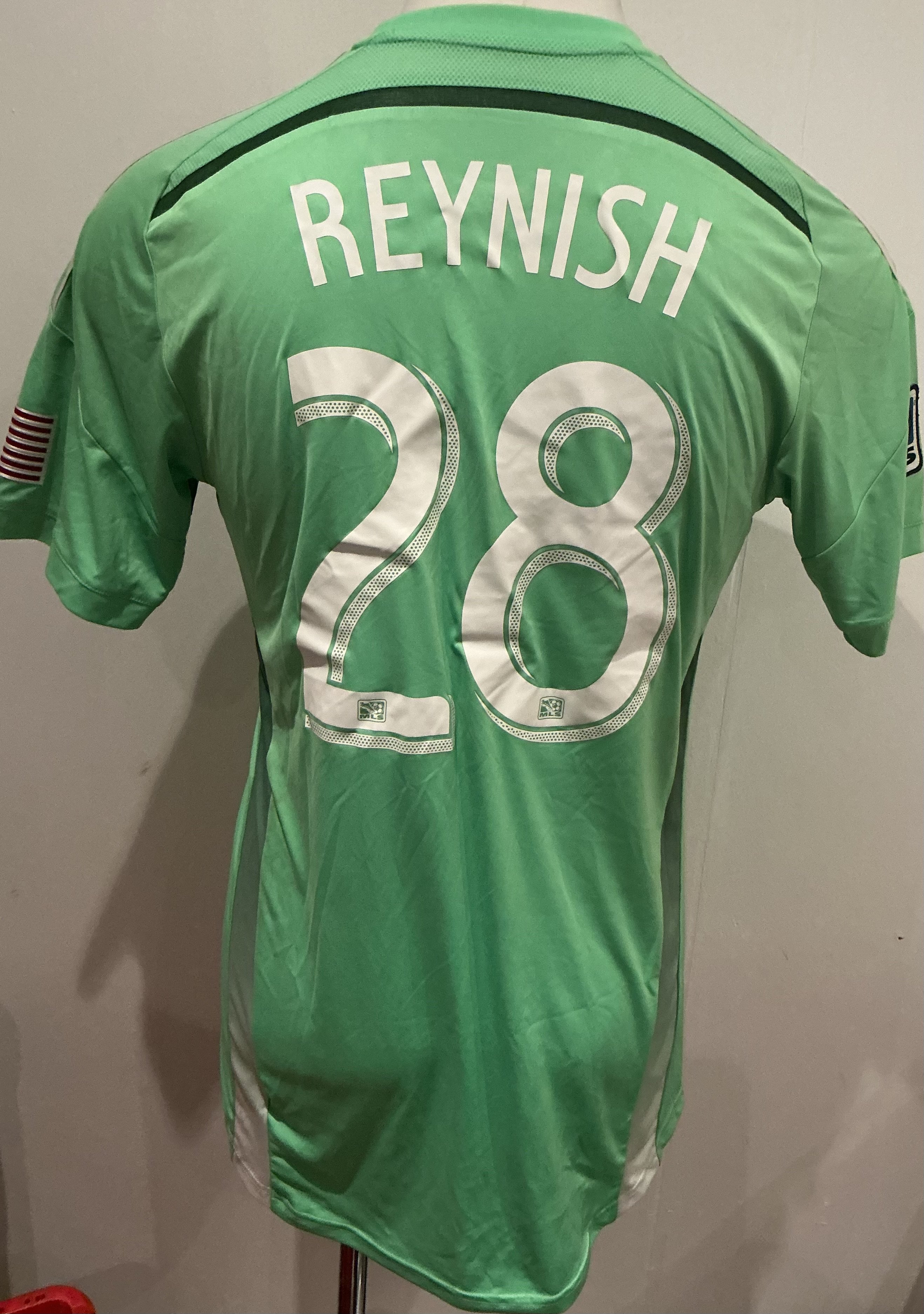 Chicago Fire 2014 - 2015 Match Worn Football Shirt: Green short sleeve number 28 with Reynish to rear and MLS badging to sleeve. Worn v Tottenham. Been washed but if you look close you can see some faint mud marks.