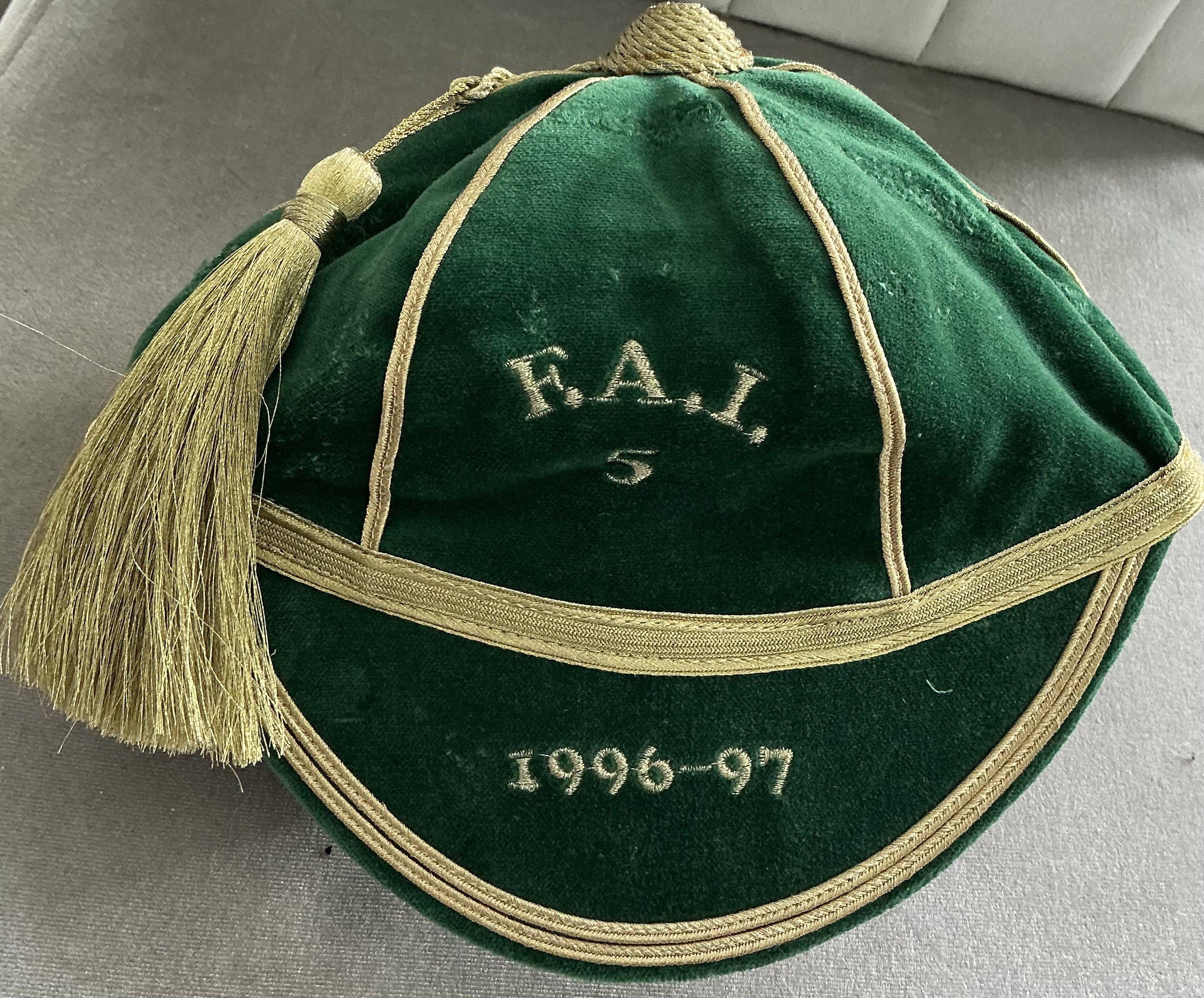 Republic Of Ireland 1996/97 Full International Football Cap: Fair condition green cap awarded to Blackburn Rovers player Jeff Kenna with FAI 5 and gold braid. Evidence of ex tape marks where previously on display.