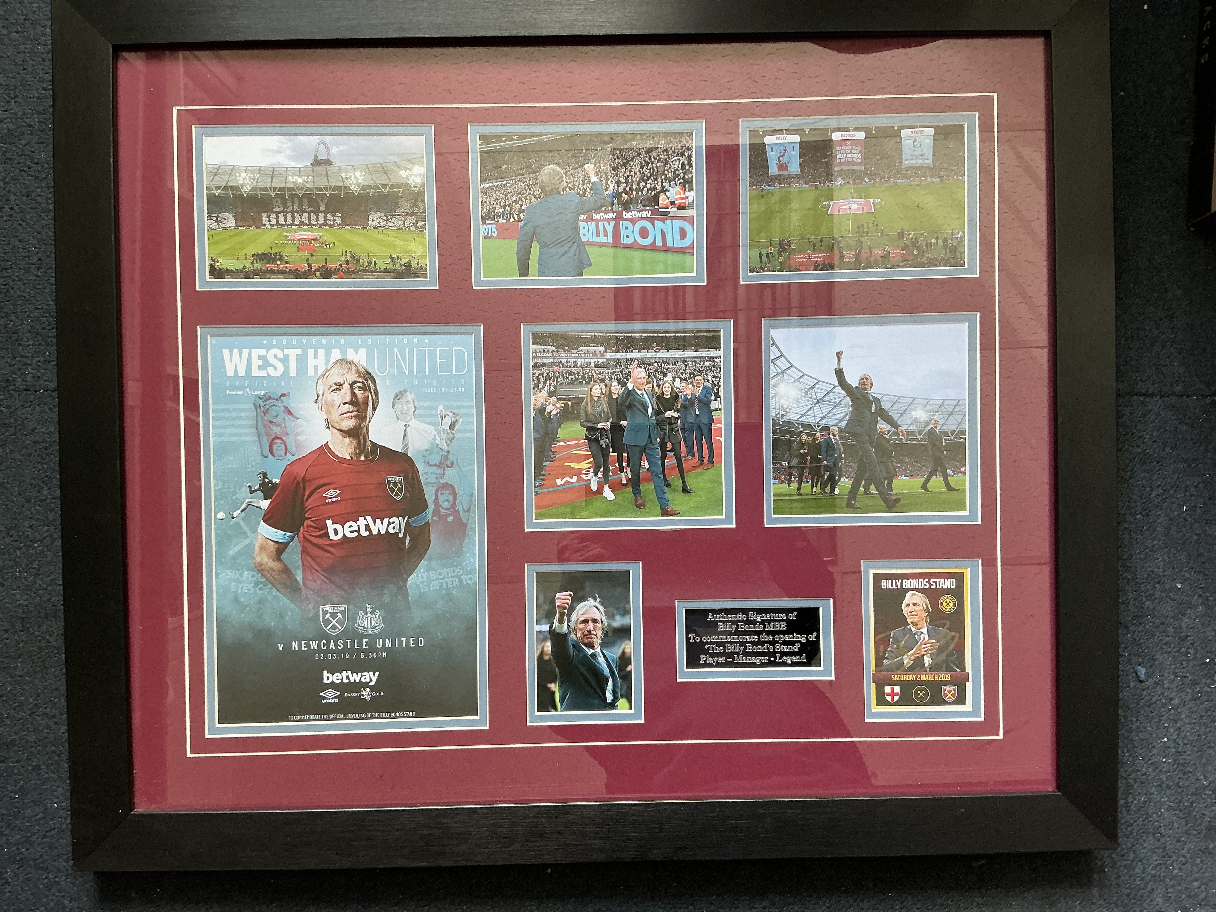 Billy Bonds Ground Opening West Ham Signed Framed Montage: Stunning 29 x 24 inch framed display of Billy Bonds featuring moments before the match when Bonds and his family came onto the pitch in 2019 when the Billy Bonds stand opened at the new stadium. A card headed Billy Bonds stand is signed by Bonds and comes with COA. Expensively framed with some heart warming photos of the great man.
