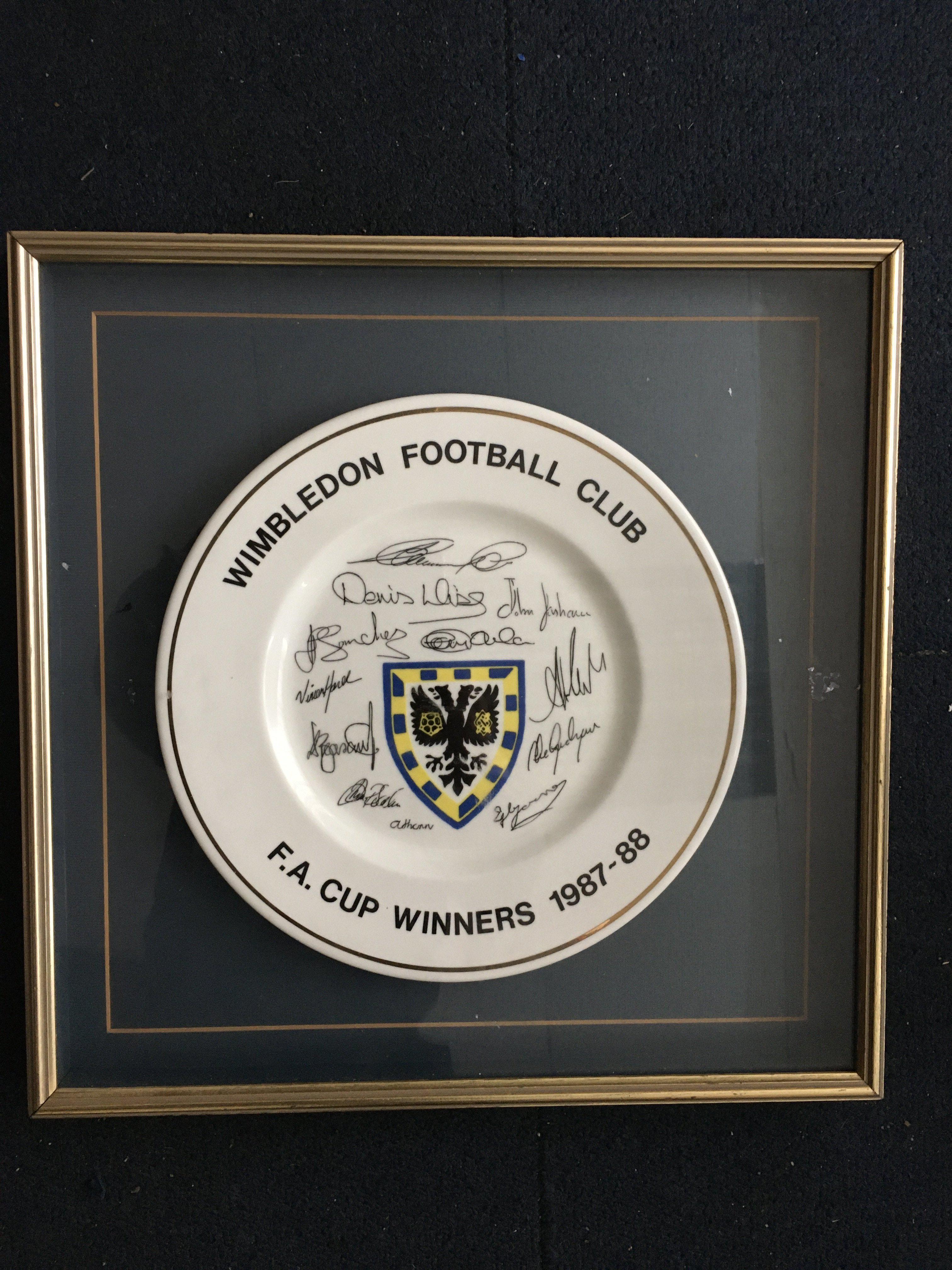 Wimbledon 1988 FA Cup Final Winners Framed Plate: Large fine bone china plate Ltd edition 1/300 with certificate to rear. Around edge it states Wimbledon Football Club FA Cup Winners 1987-88. Centre has the club badge and facsimile signatures of the team. Nicely framed.