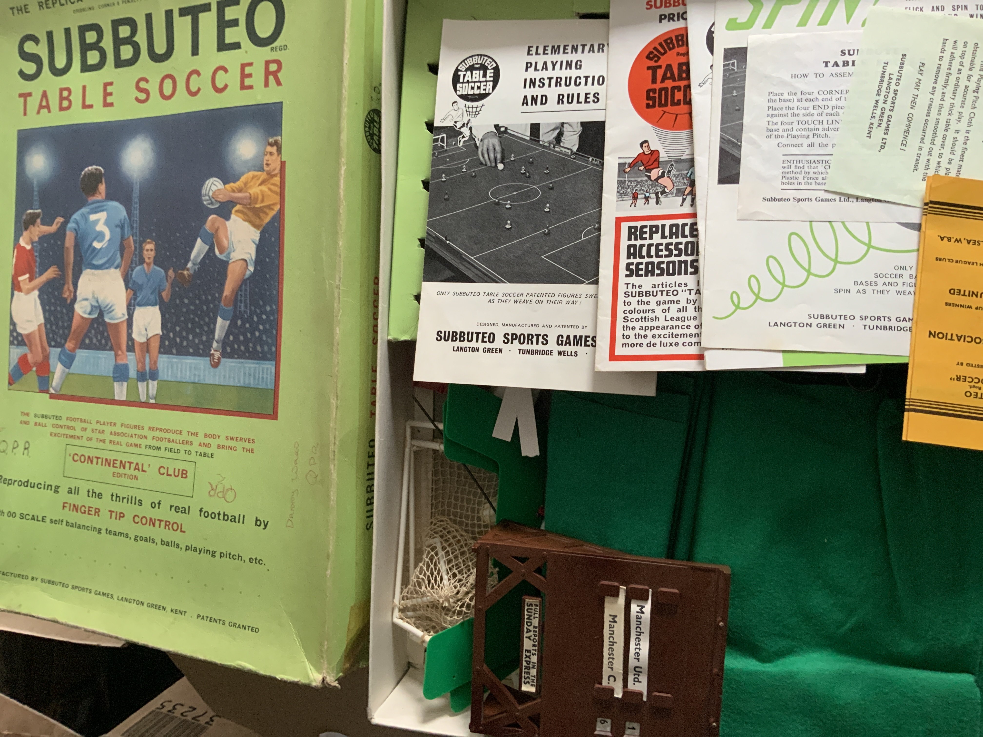 Subbuteto Football Game + Teams: Table soccer game Continental Edition which has paperwork scoreboard goals team names pitches players etc. No full teams so not complete. C/W 6 complete teams. Boxes have writing.