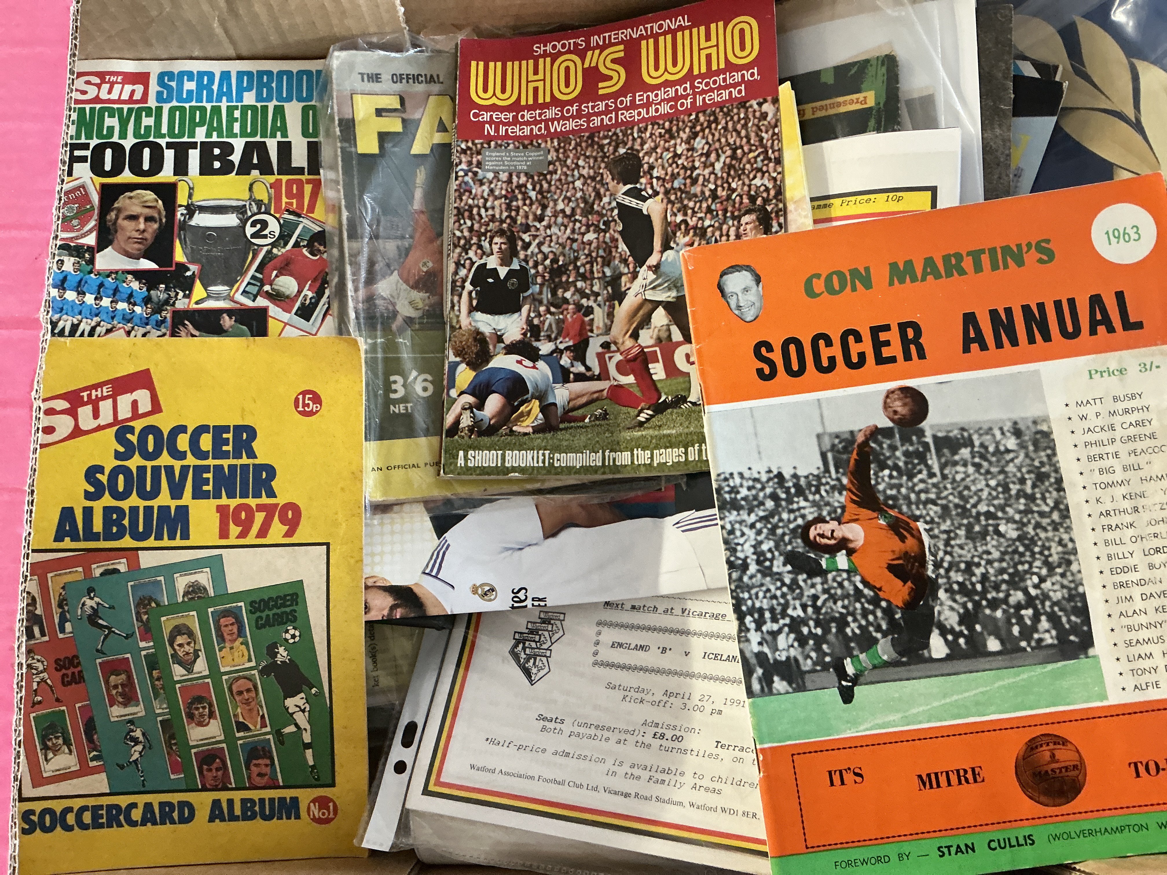 Football Memorabilia Box: Includes books, Football League Reviews, menus, cup final token sheets, records, coins sets, programmes including replica big match, cards and more. Instructions to sell. (2 boxes)