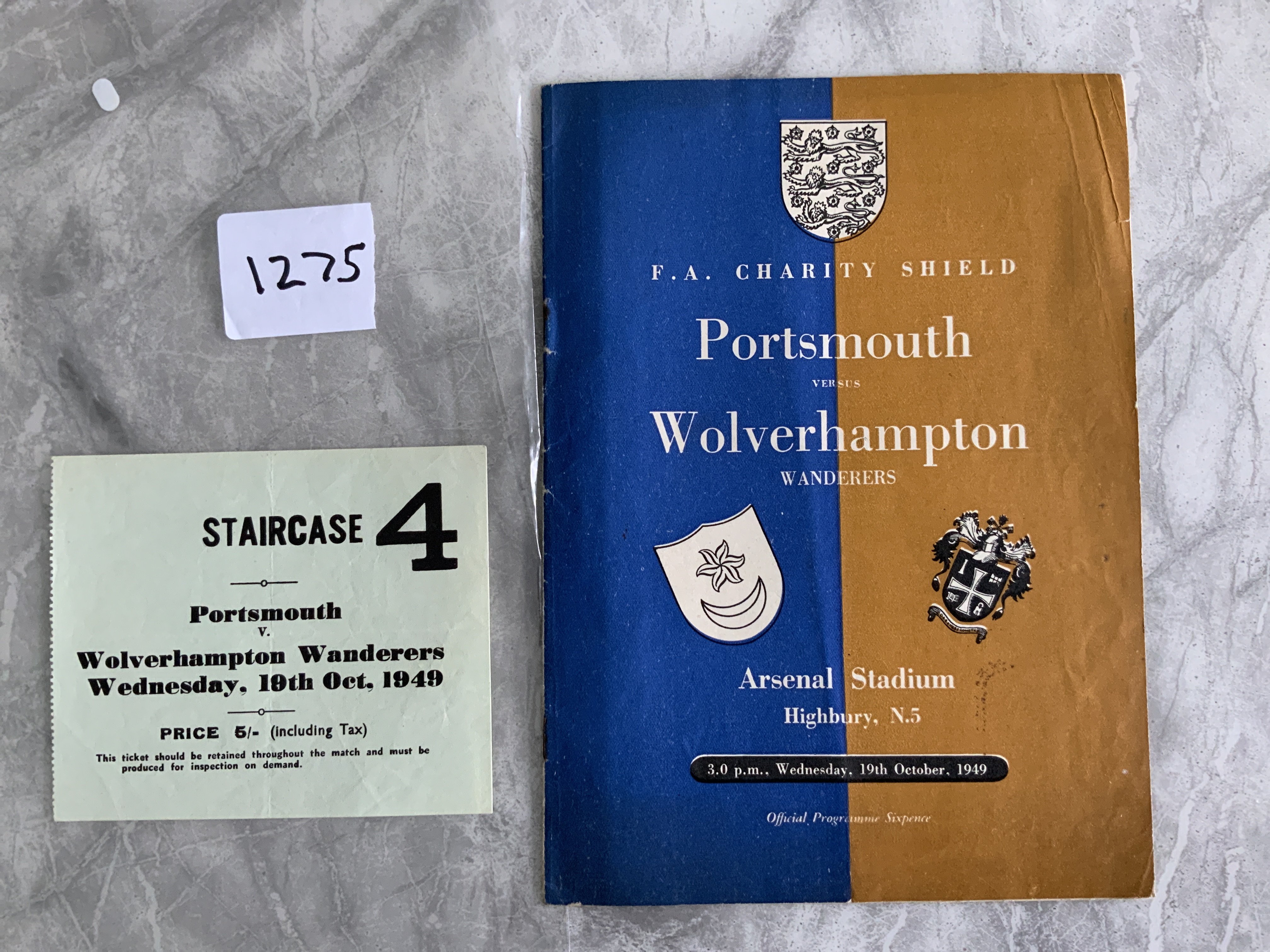 1949 Charity Shield Football Programme + Ticket: Portsmouth v Wolves played at Arsenal. Both very good with pencilled team changes to programme. Light folding. (2)