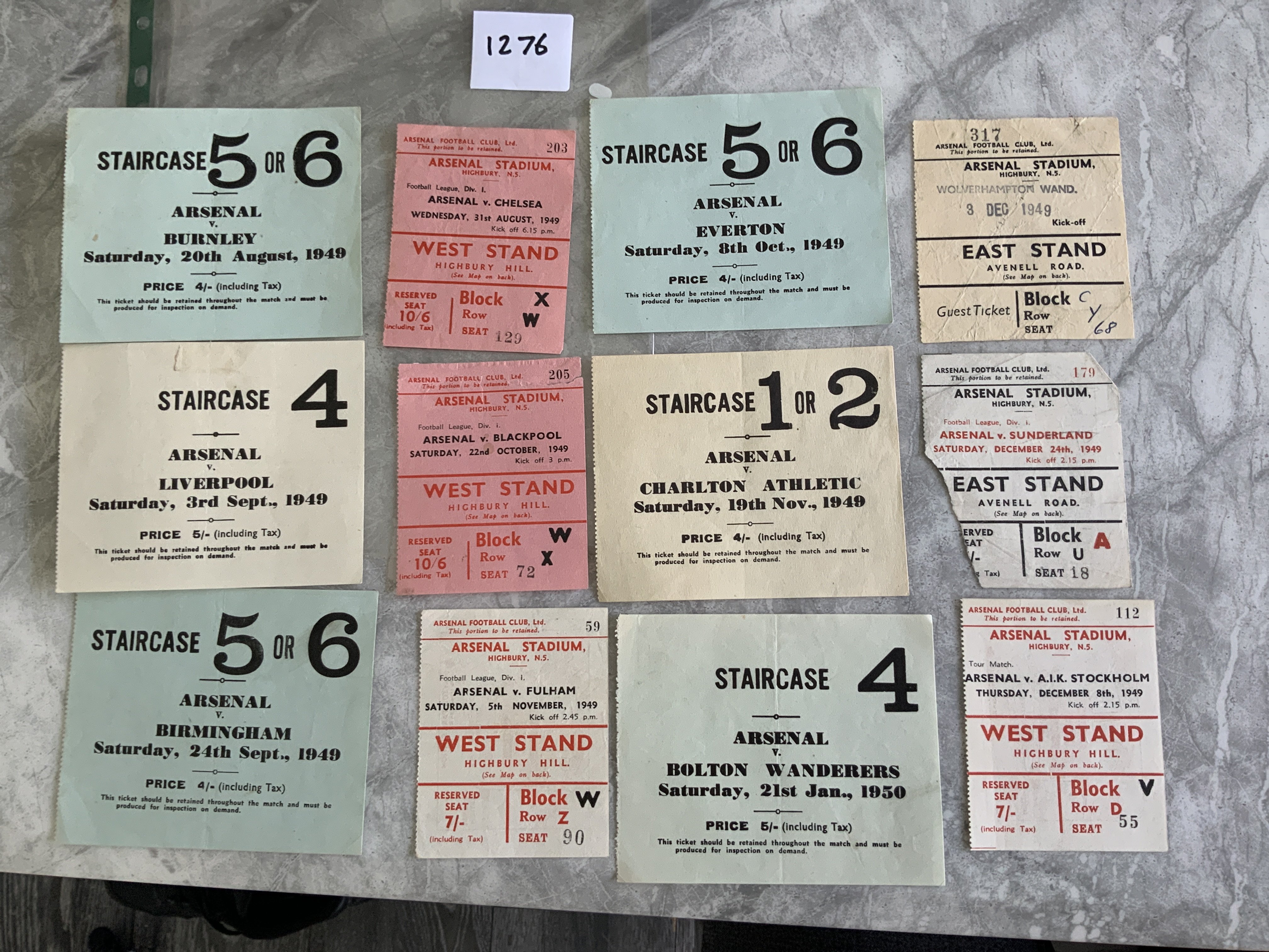 49/50 Arsenal Home Football Tickets: 20 different tickets which are mainly league matches but include all 4 tickets in the FA Cup winning season. Excellent condition with both the smaller seat tickets and the larger standing tickets. Sunderland has a piece missing and Derby has been previously stuck down. Very rare chance. No duplication. (20)