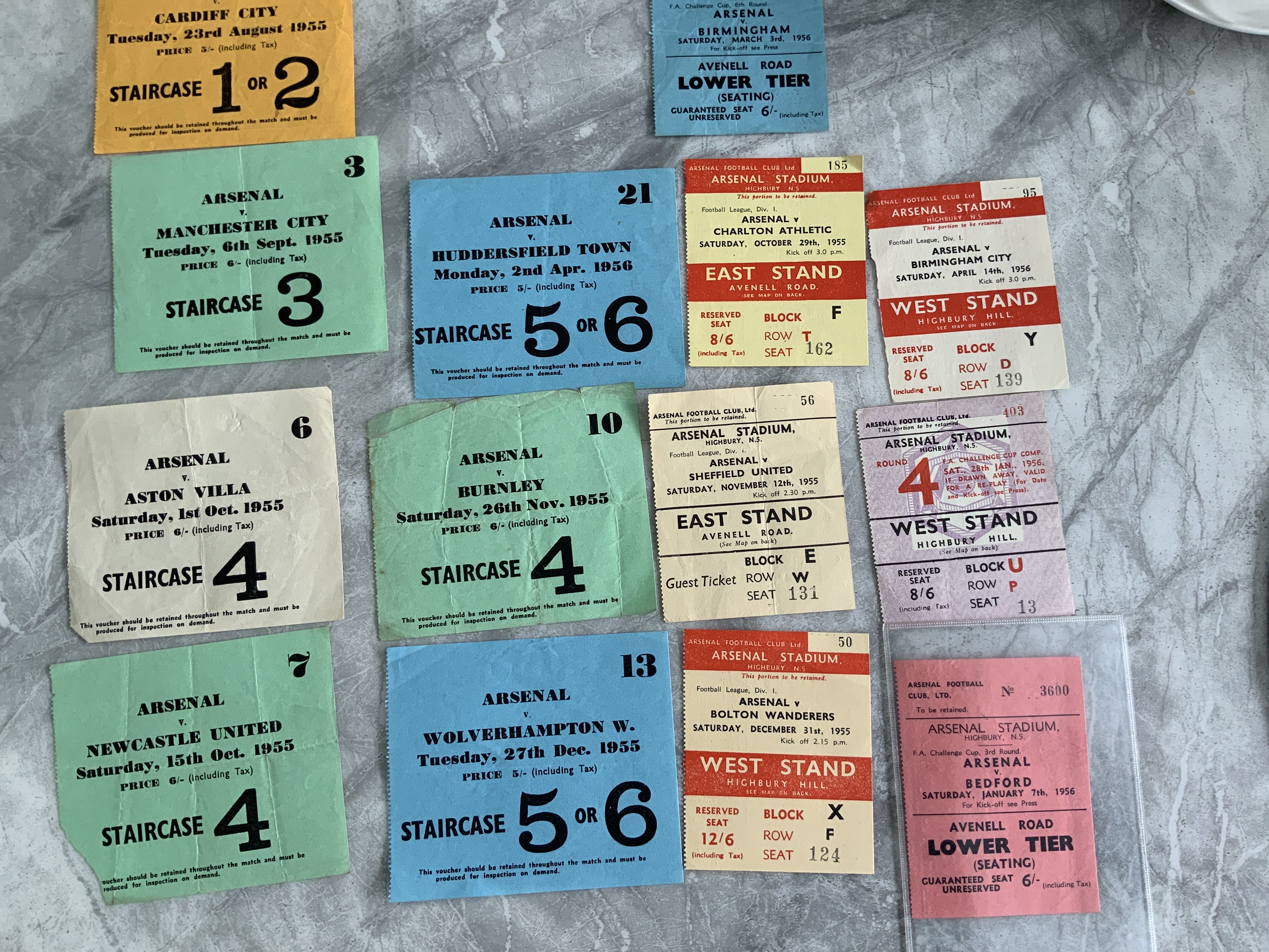 55/56 Arsenal Home Football Tickets: 14 different good condition tickets which are League and FA Cup matches to include Bedford. Excellent condition with both the smaller seat tickets and the larger standing tickets. Very rare chance. No duplication. (14)