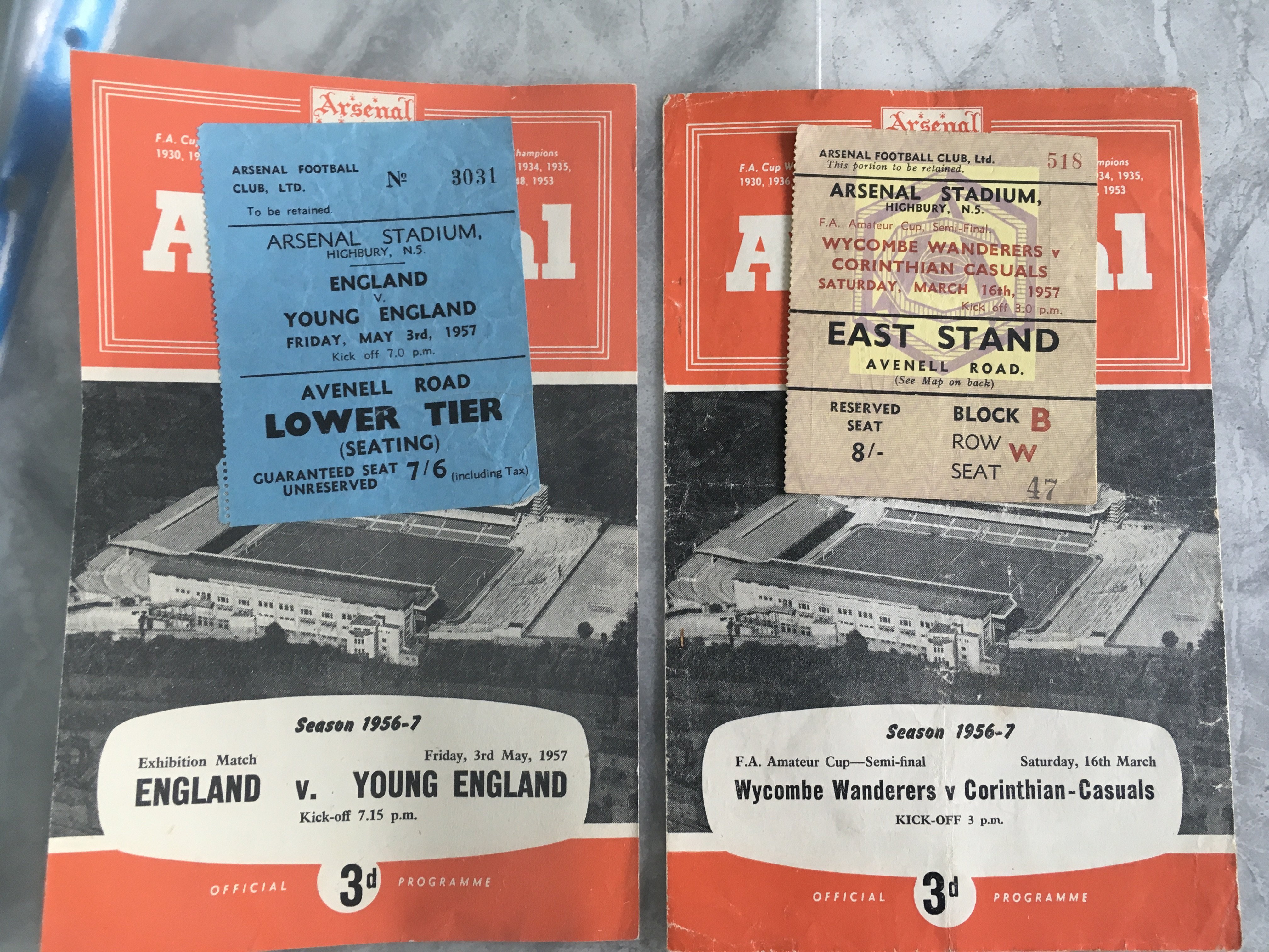 56/57 Football Programmes + Tickets Of Matches At Arsenal: Amateur Cup semi final Wycombe v Corinthians programme + ticket, England v Young England programme + ticket plus programmes for London Senior Cup Final and Army match. Very good. (6)