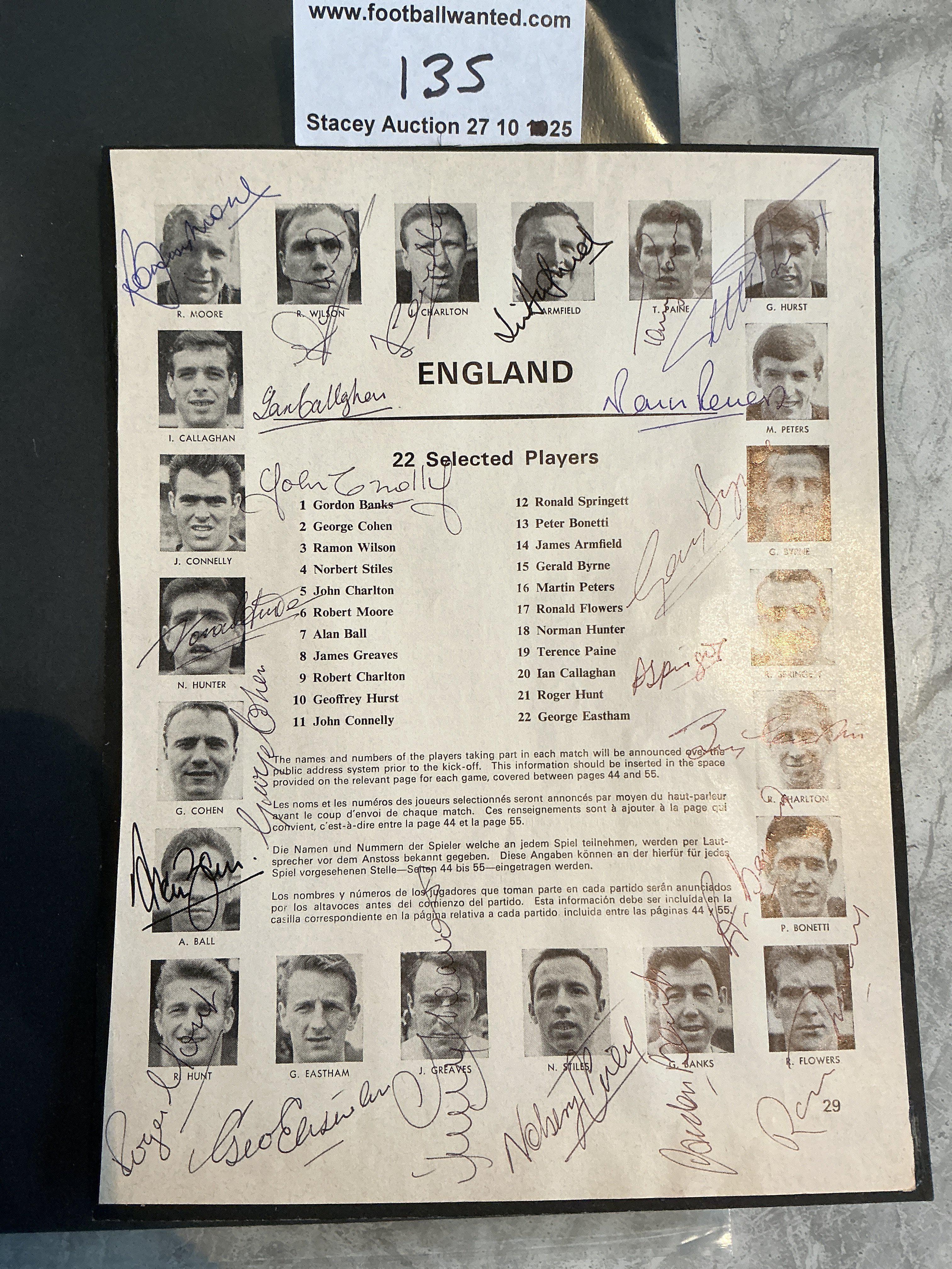 England 1966 World Cup Squad Fully Signed Programme Page: Removed from tournament programme page 29. Pictures all 22 of the England team and hand signed in biro by everyone of them including Bobby Moore and Bobby Charlton. Stunning item laid down to black card.