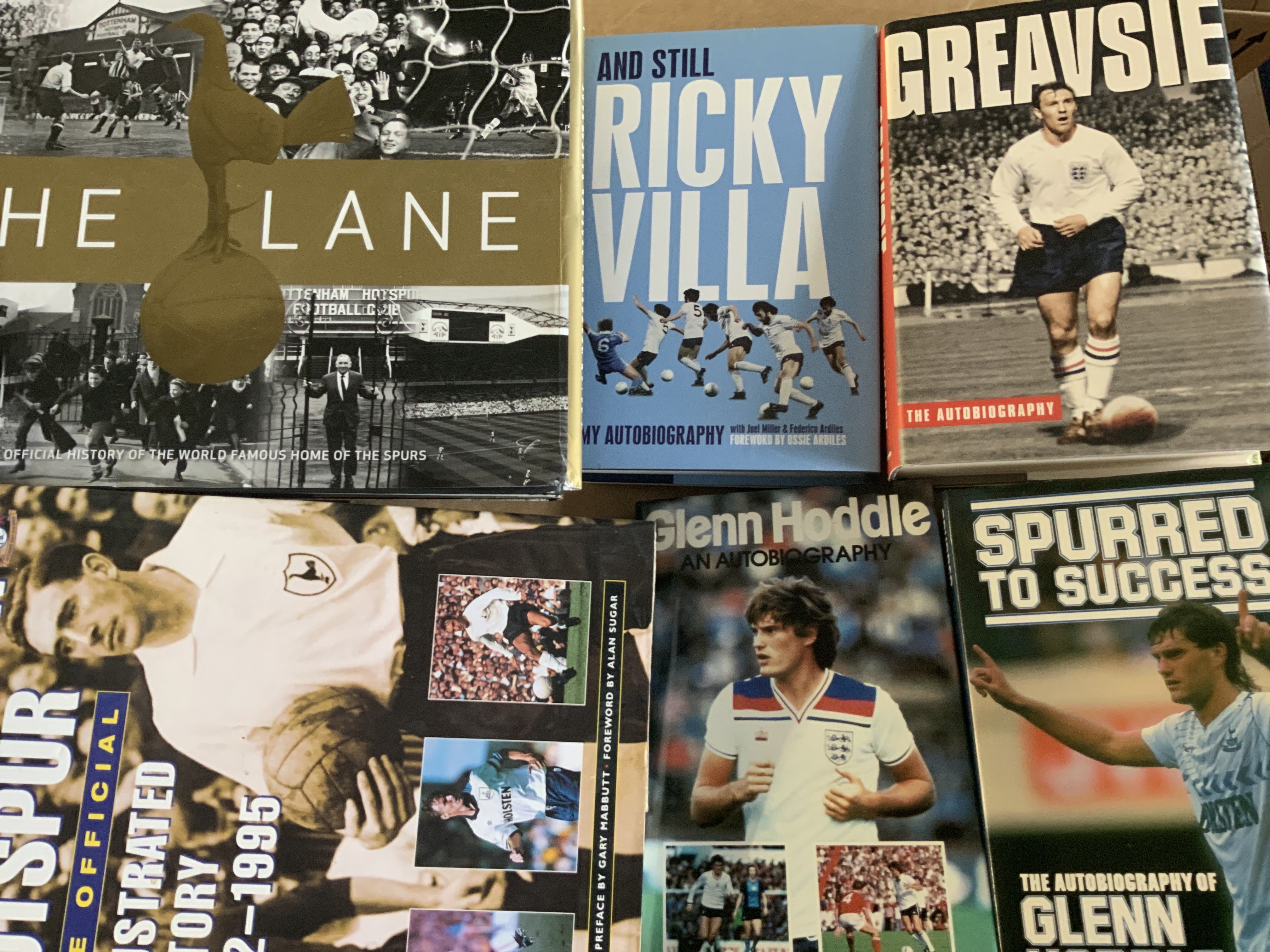 Tottenham Football Book Collection: Autobiographies of Ginola Greaves Villa Hoddle plus records, programme binder, big match programmes and more. (2 boxes)