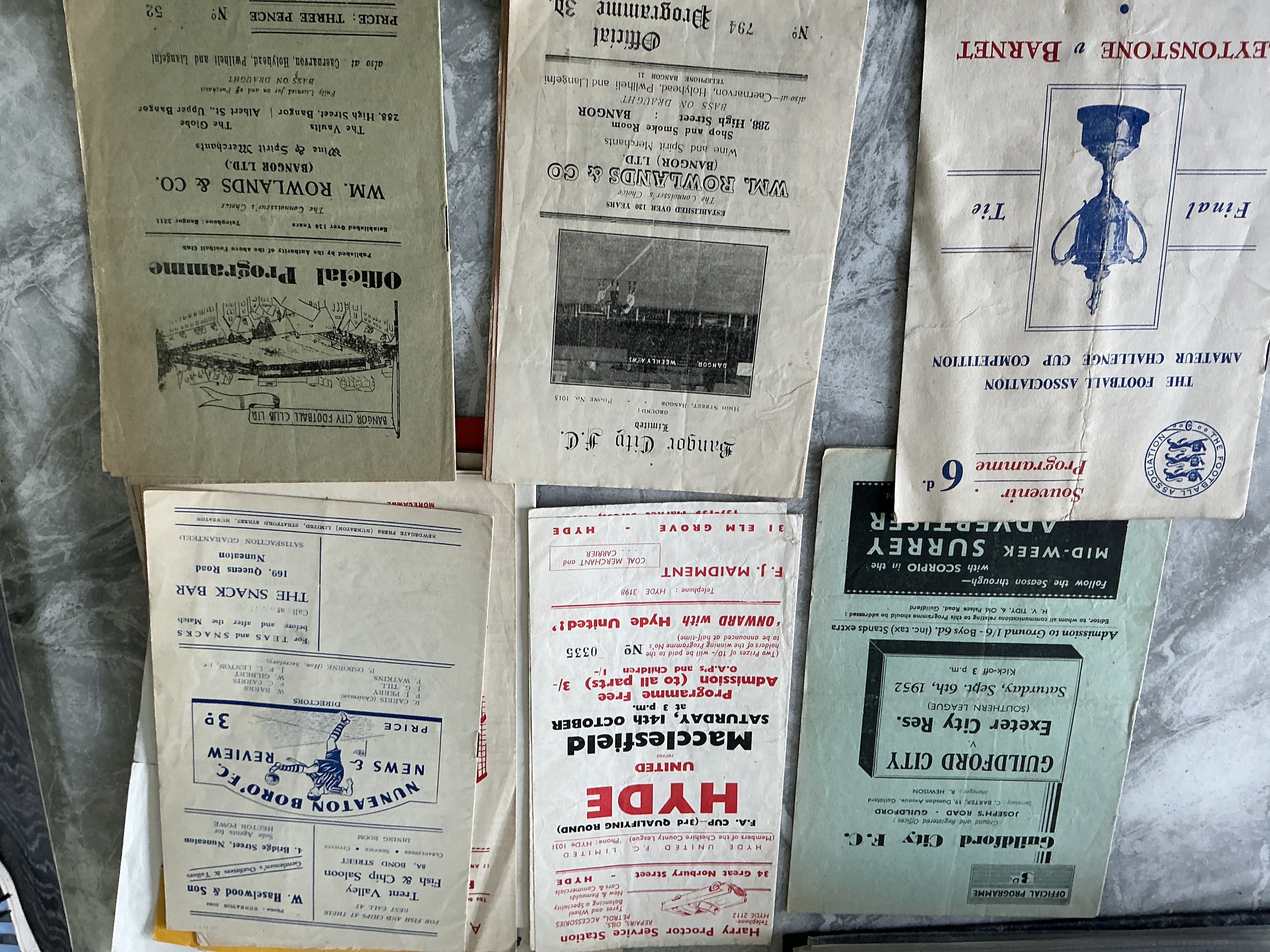 Non League Football Programmes: 1948 Amateur Cup Semi Final at Chelsea fold, Bangor v 53/54 Chester, Caernarfon 50s, 52/53 Guildford v Exeter reserves. 40s homes of Barking, Cambridge Town, Maidenhead, Wolverton and some good 50s and 60s.