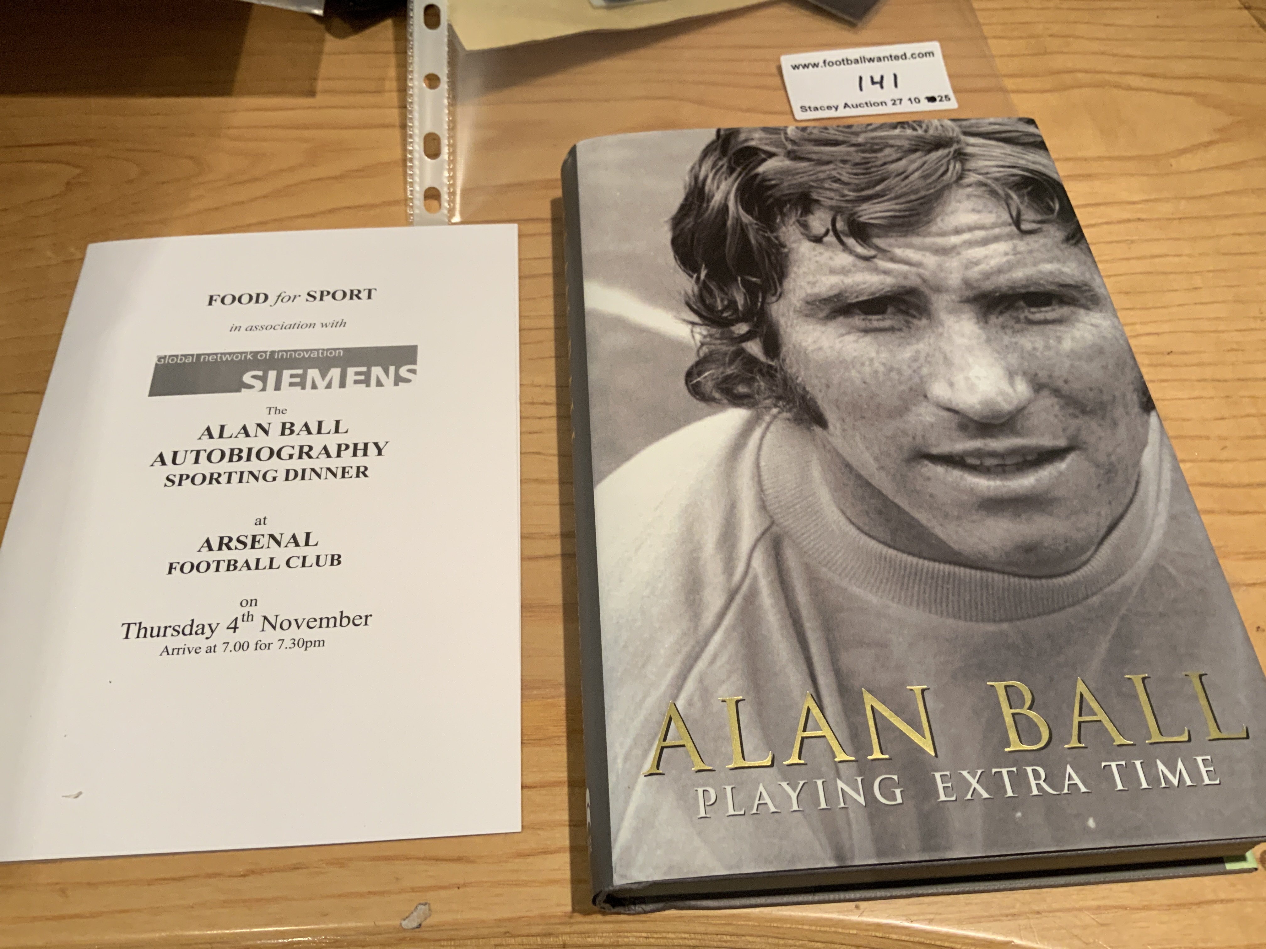 Alan Ball Arsenal + England Multi Signed Football Book: Hardback book with dust jacket signed at the launch of his autobiography at Arsenal and comes with menu to mark the event. Ball has signed twice and includes team mates and friends including Bob Wilson Jack Charlton Frank McLintock Tommy Docherty and boxer Dave Boy Green.