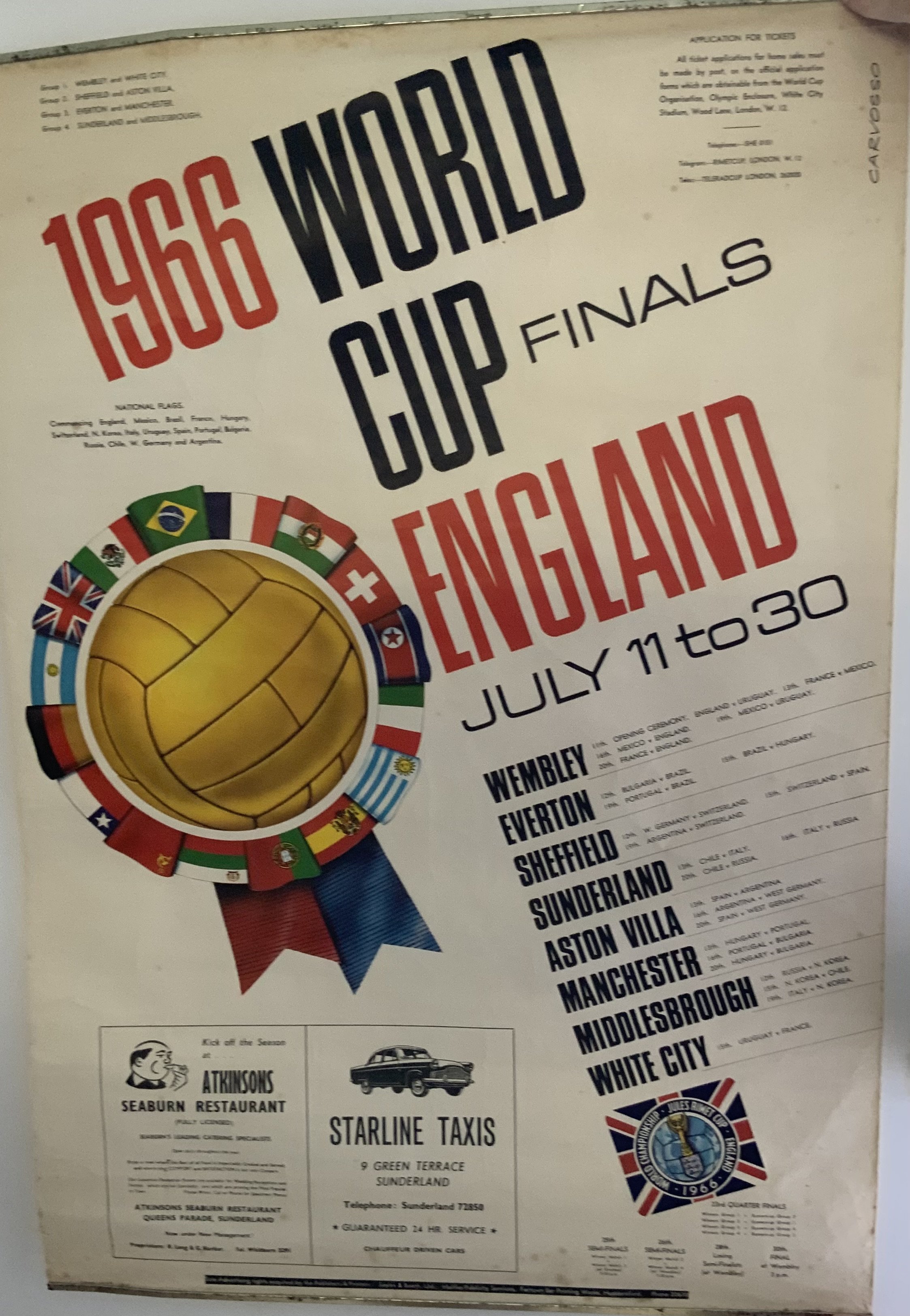 1966 World Cup Football Poster: Very large original 29 x 20 inch poster by Carvosso in good condition with metal either end for displaying at stations etc. Attractive with venues and fixtures, participating teams flags and World Cup logo.