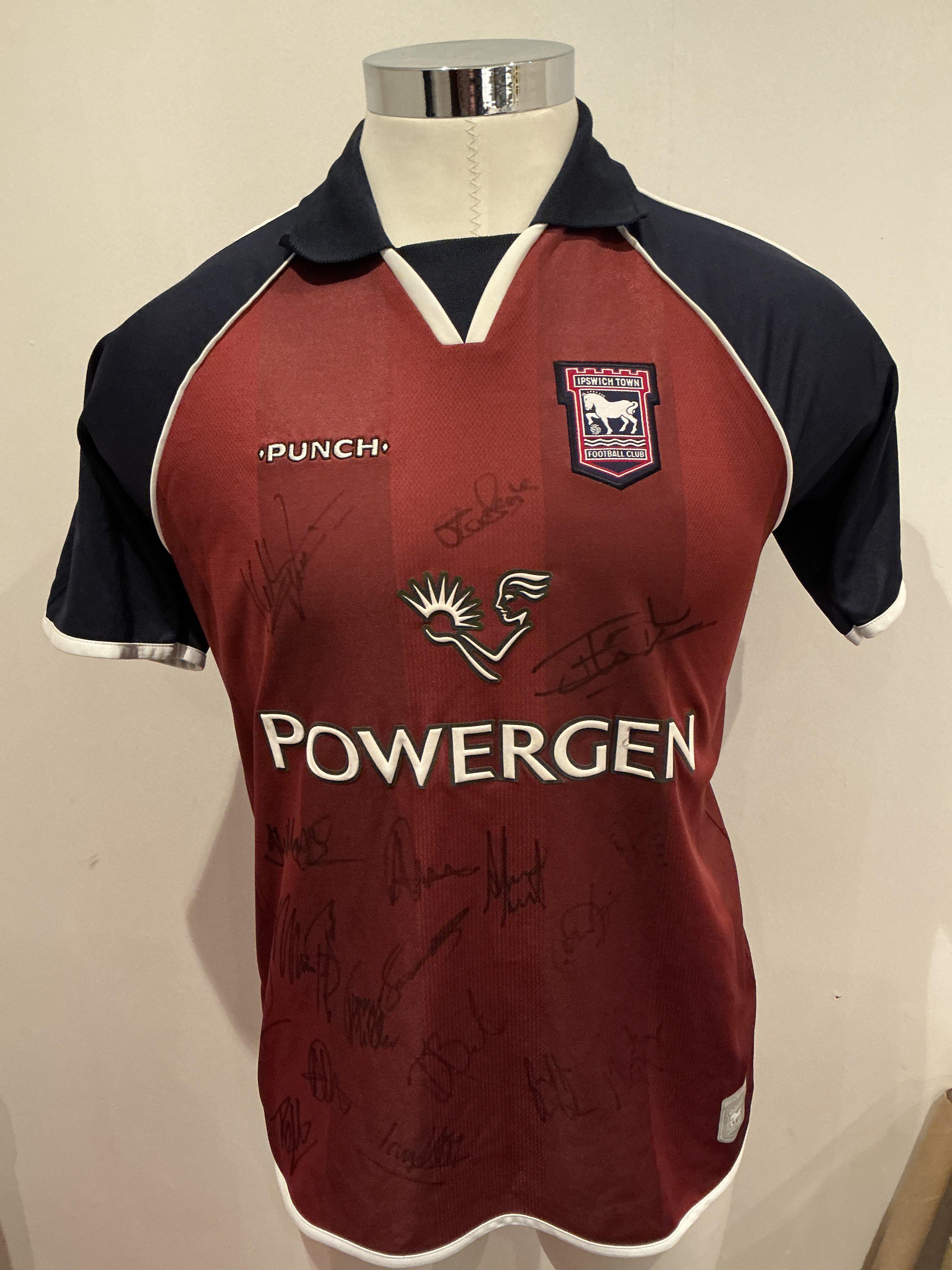2003 - 2004 Ipswich Town Signed Football Shirts: Home and away large shirts signed by the squad to both. Genuine autograph given to well known Ipswich scout. (2)