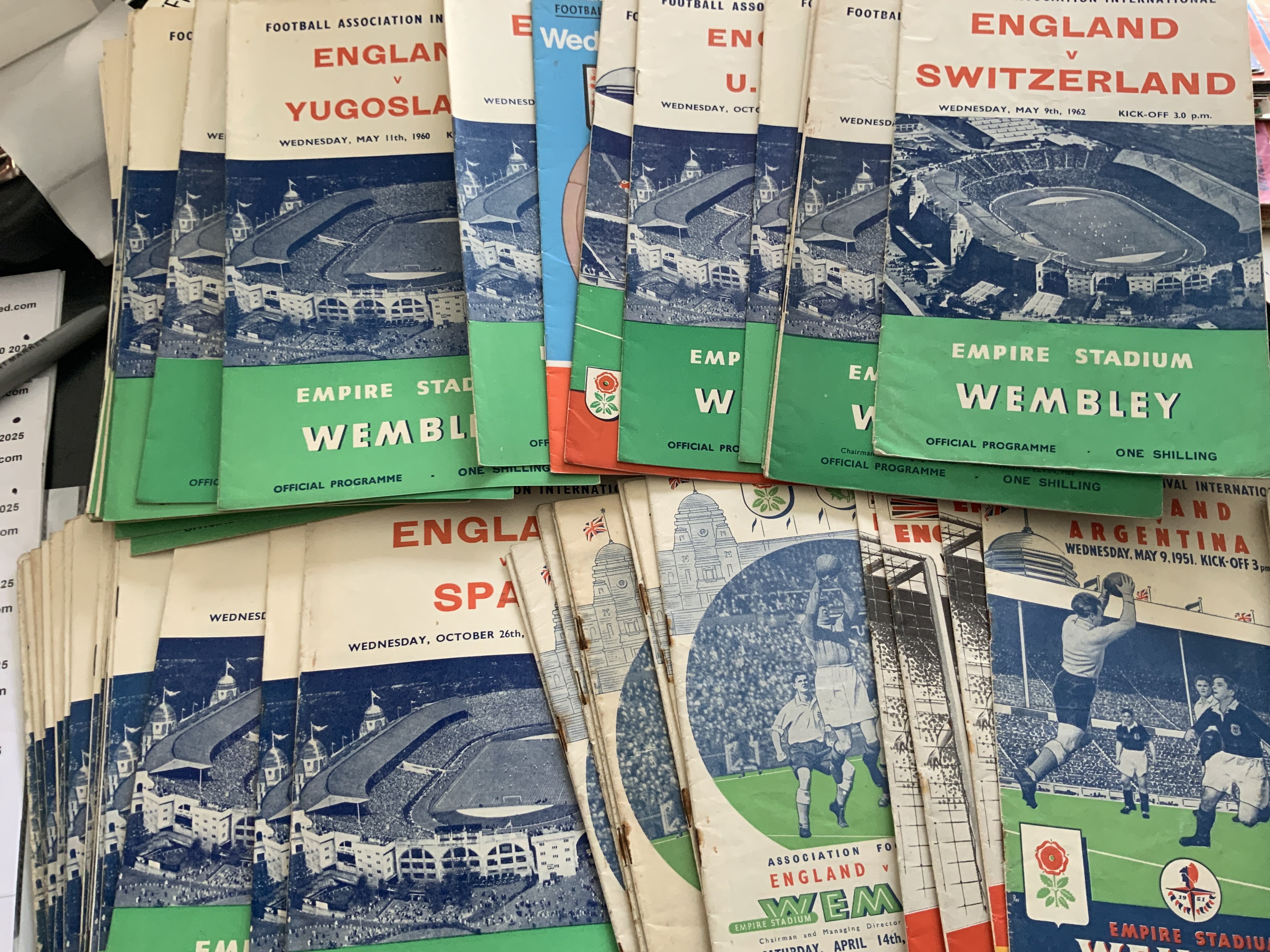 International Football Programmes. Large duplication to include 8 x 1951 England v Scotland, 1952 England v Belgium x 3. Includes Irish Inter League matches, U23, Schools and much more with good England and Scotland content. Fair/good. Large quantity in 2 boxes.