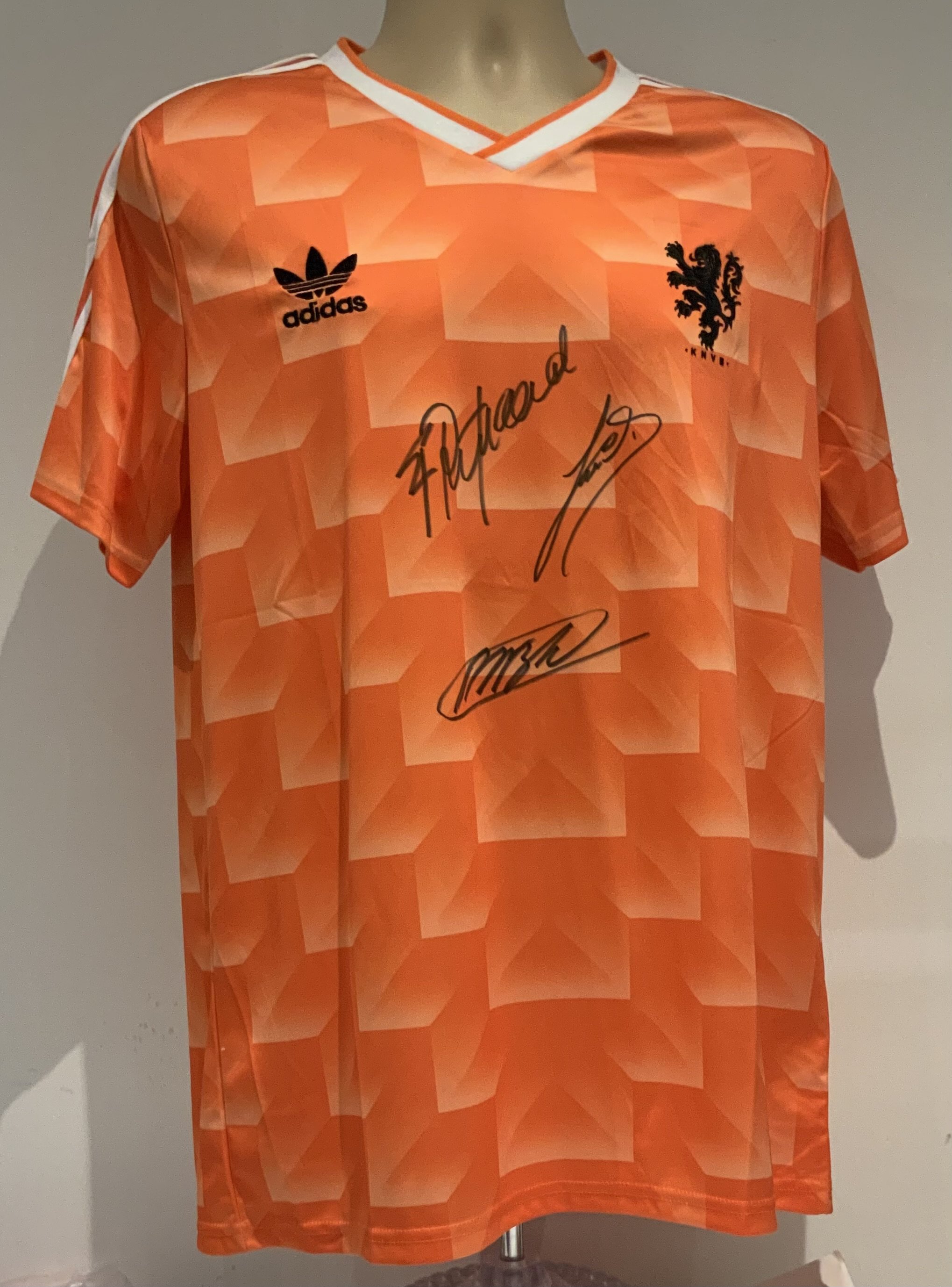 Holland Signed Football Shirt: Short sleeve Adidas shirt signed by Dutch legends Gullit Van Basten and Rijkaard. Good condition.