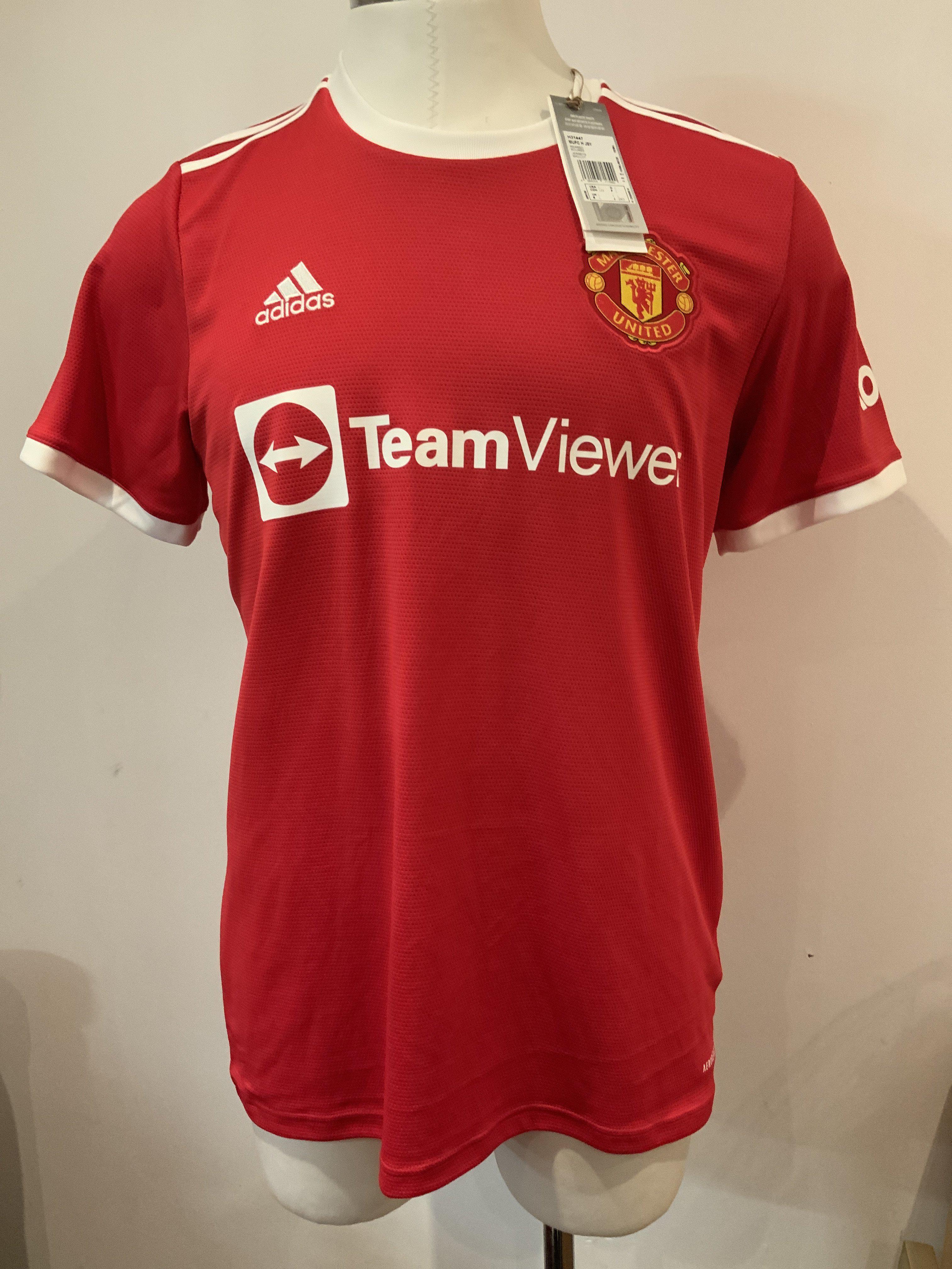 Cristiano Ronaldo Signed Replica Manchester United Football shirt: Red Adidas shirt signed to the reverse in size Large. Creasing and light general wear, some minor stitching irregularities.