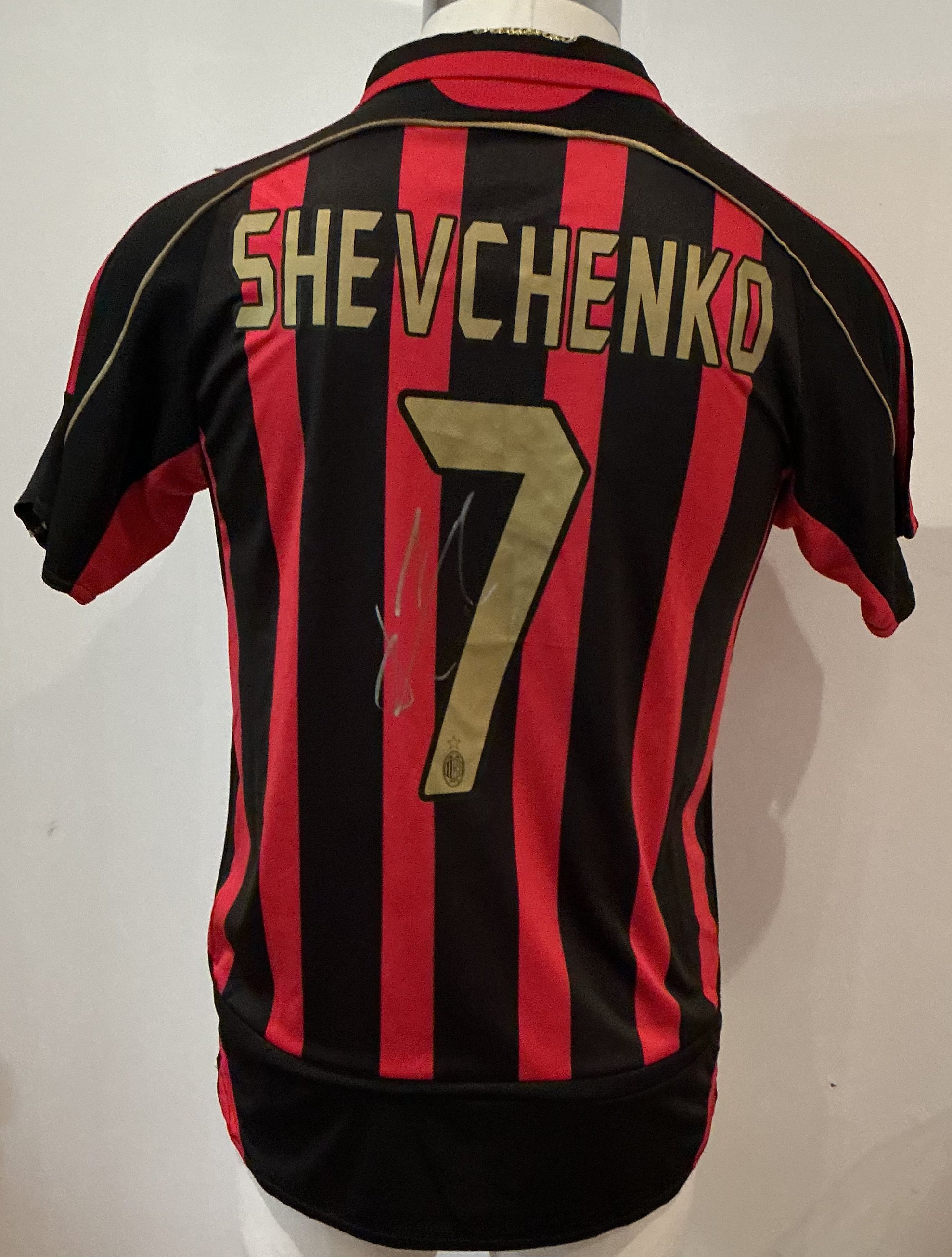 AC Milan Shevchenko Signed Football Shirt: Andriy Shevchenko signed AC Milan replica home football shirt size medium. Good condition.