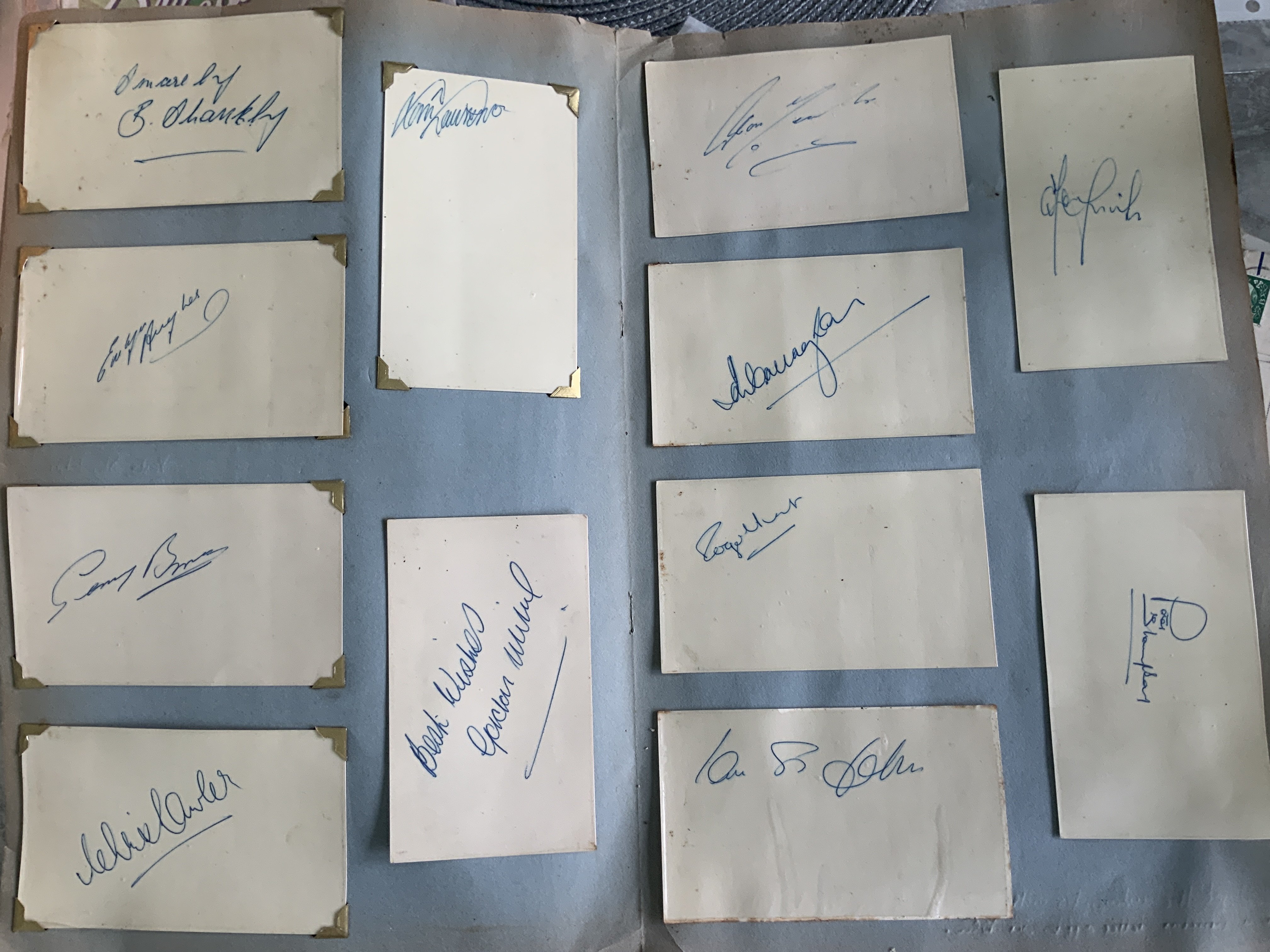 Liverpool 1967 Football Autographs: White postcards signed in 1967 with correspondence between recipient in the form he sent to Bill Shankley asking for the autographs for his nephew and a further letter to the nephew to say they are enclosed. The 12 postcards are hand signed and clipped into scrapbook with removable plastic to each one. Includes Shankley St John Callaghan Hunt Thompson Byrne Hughes Milne Lawrence Lawler and others.