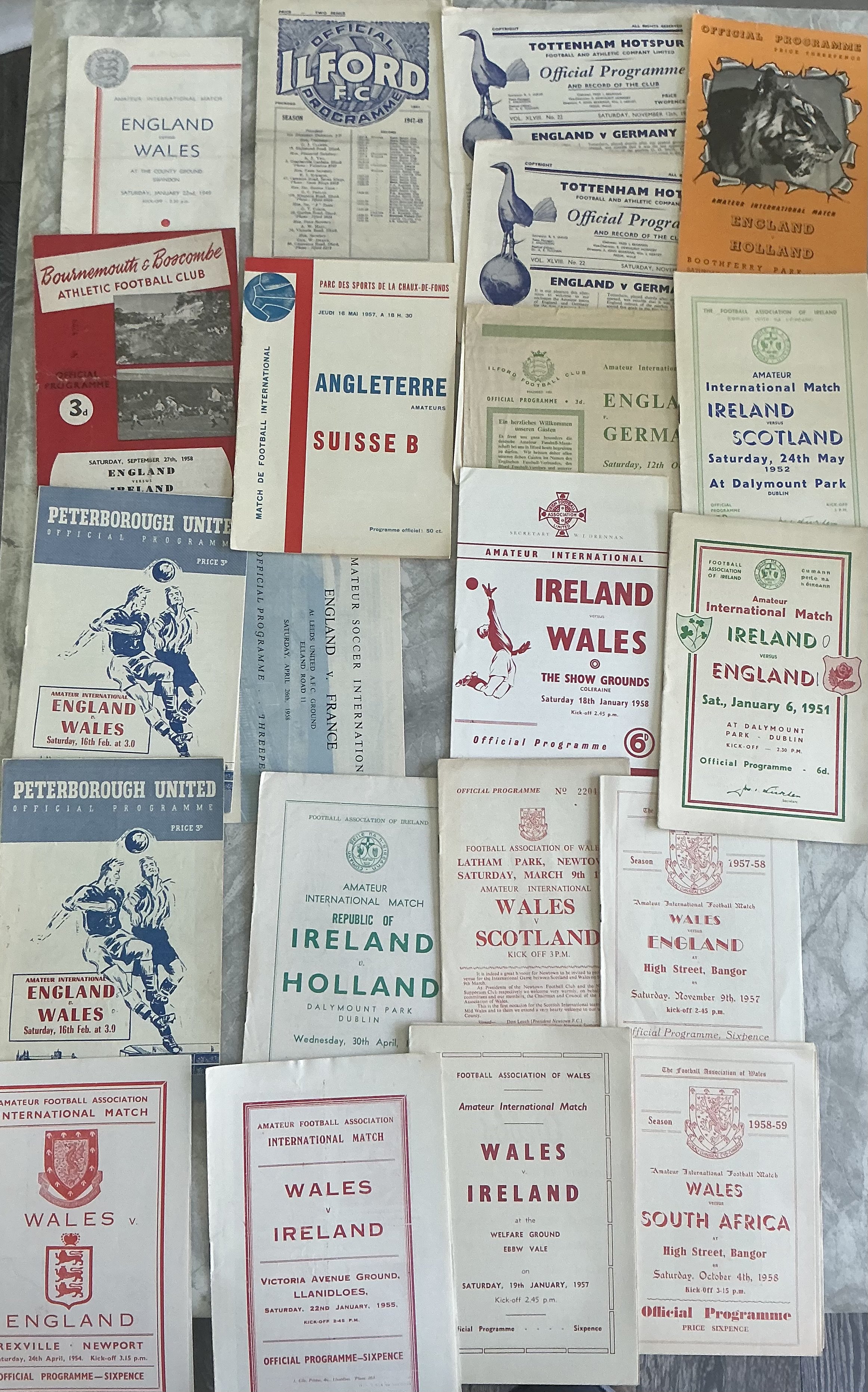 1950s Amateur International Football Programmes: Some harder to obtain programmes and some small grounds. England matches at Tottenham Leeds Peterborough Bournemouth Ilford Swindon Crystal Palace and Wembley. Wales homes at Bangor Newtown Newport Llandudno Llanidloes, Ireland at Dalymount Park Coleraine. There are some Olympic Games 1956 in Australia and some played abroad to include 1954 Holland v England, 1957 Switzerland v England, France v England, 1959 Germany v Poland, Austria v Czechoslovakia. Mainly excellent with duplication and all 1950s. (83)