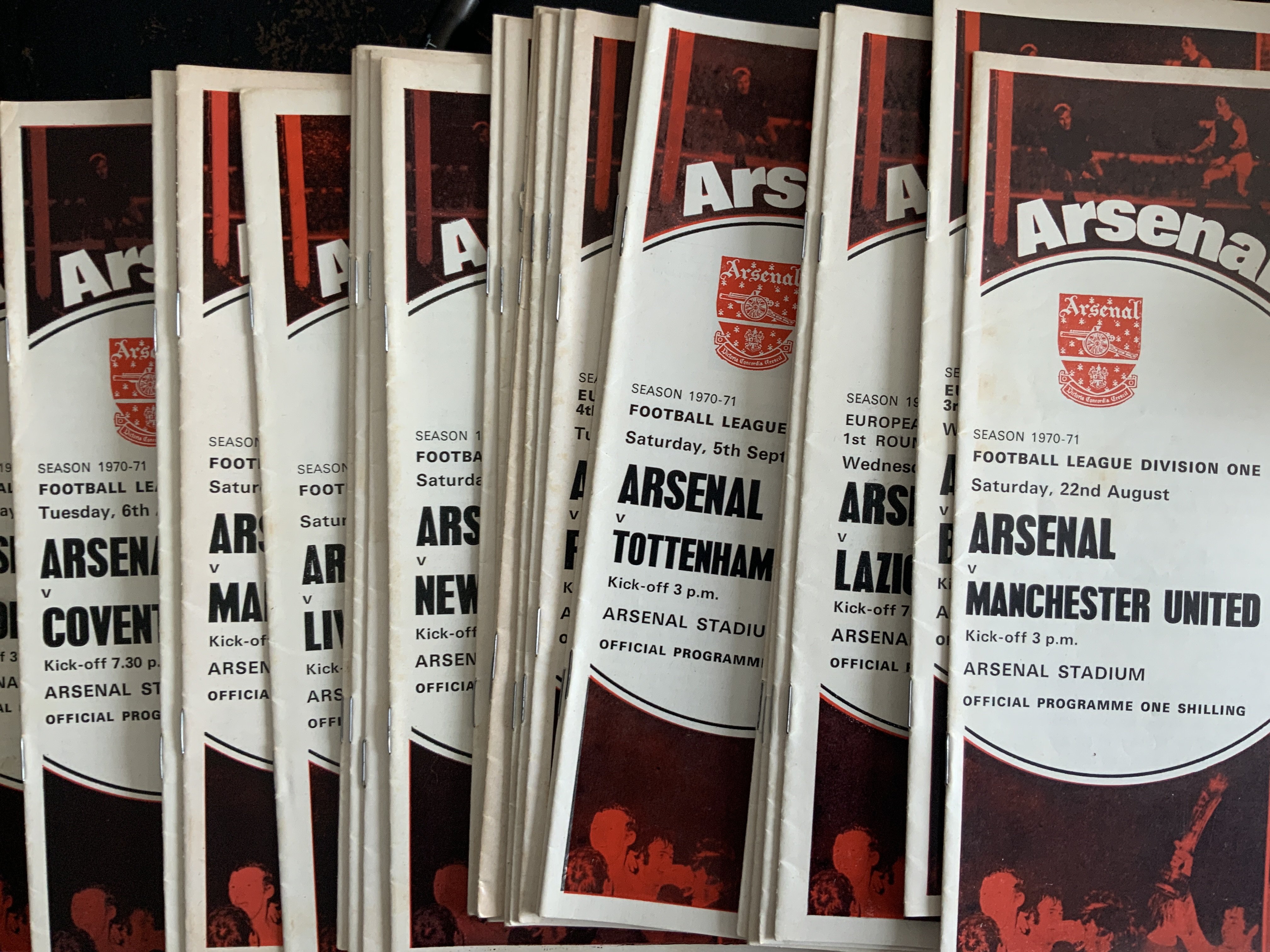 Arsenal 70/71 Home + Away Football Programmes + Memorabilia: 29 home programmes with tokens intact from the double season. There are 19 away programmes including final and semis and title decider at Tottenham. C/W car sticker, papers, magazines programme binder and handbook. (62 items)