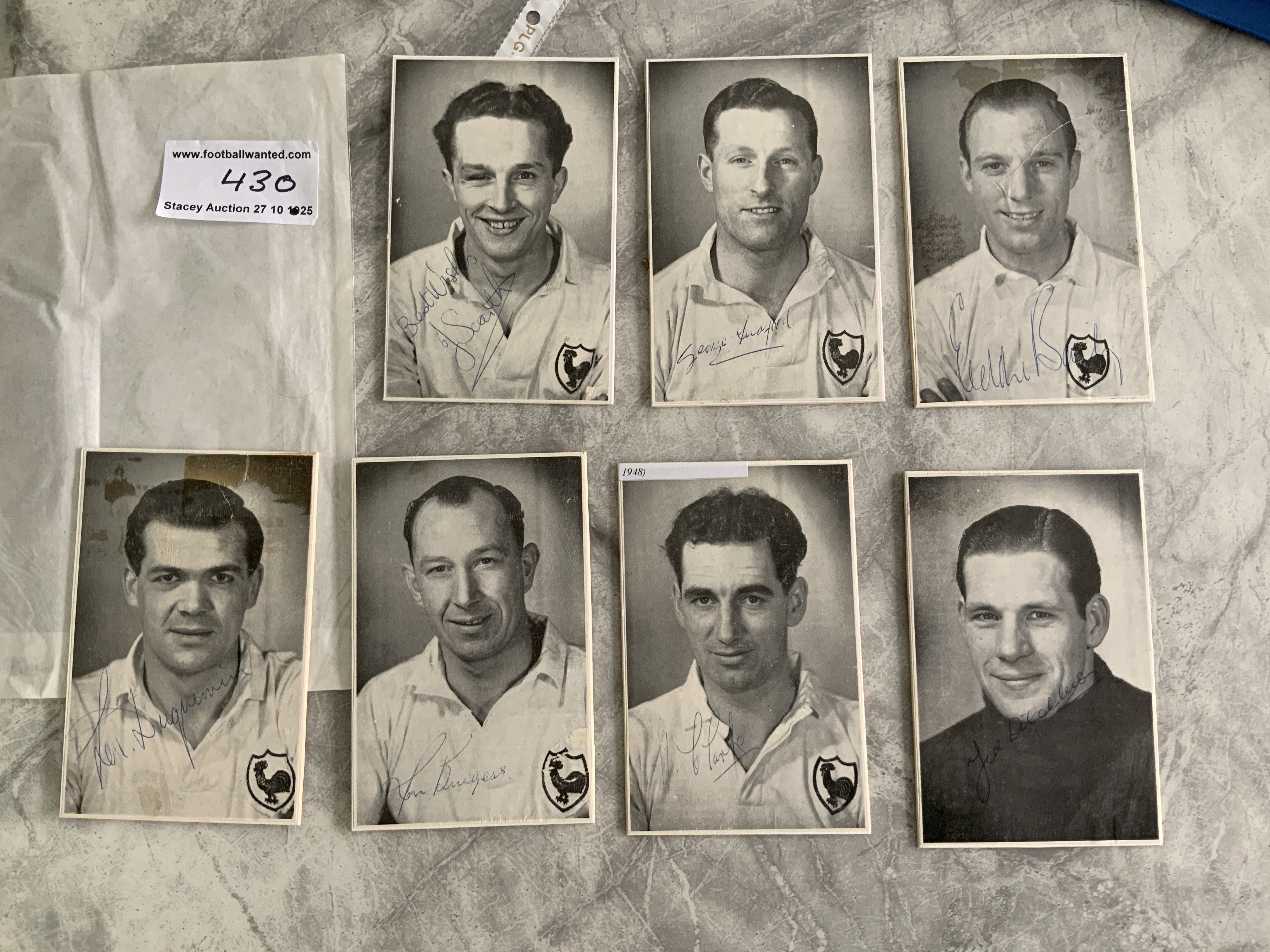 49/50 Signed Tottenham Photos: Believed be removed from the 1950 players guide book which was celebrating promotion to division one. Hand signed and mounted on thick card. 7 postcard size signed pictures are Ditchburn Clarke Burgess Duquemin Baily Ledford and Smith.