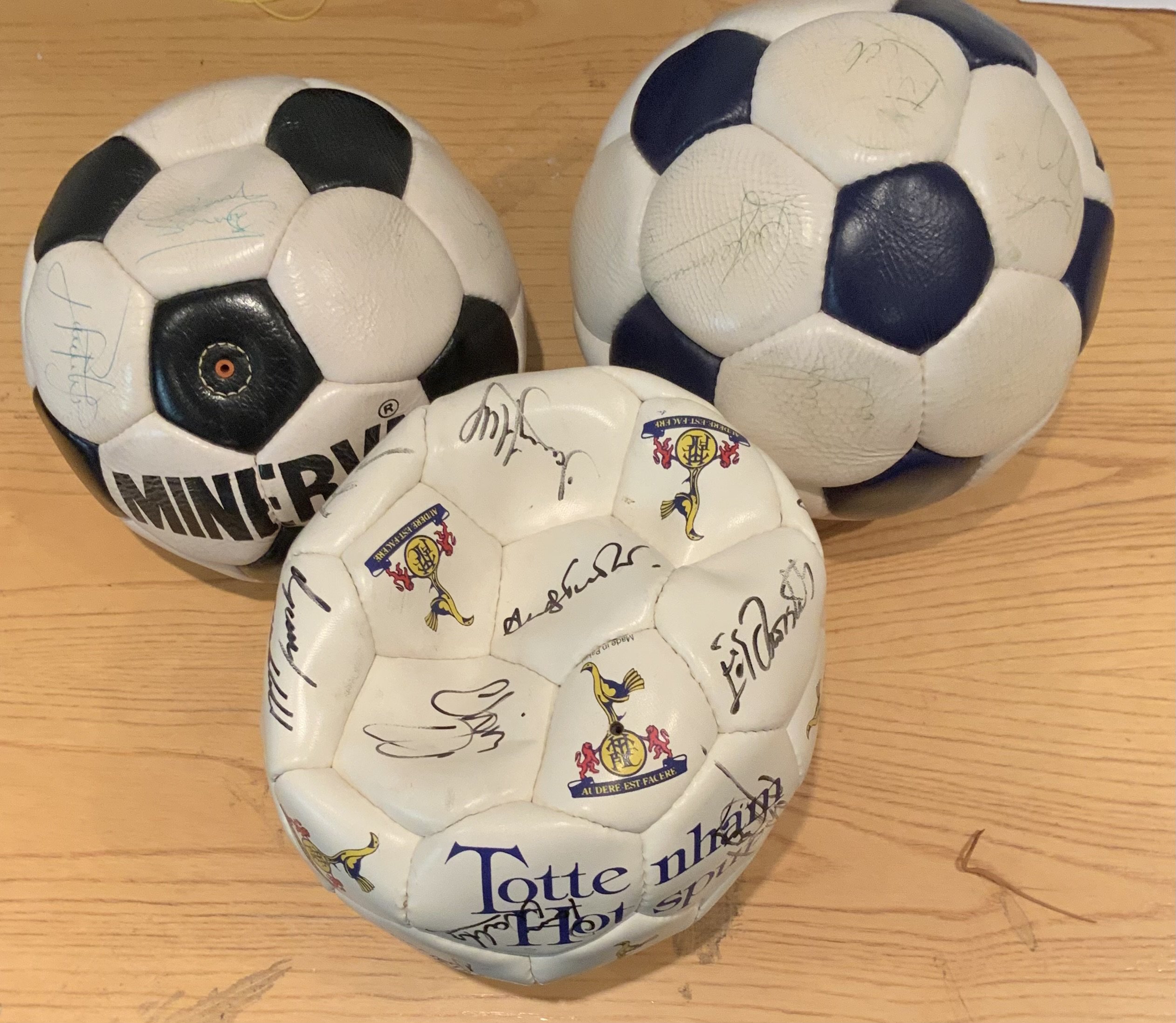 Tottenham Football Squad Signed Footballs: Three multi signed footballs from circa late 1980s. Two balls have pen signatures that are fading. Signatures include Clemence Stevens Roberts Allen Mabbutt and many more. (3)