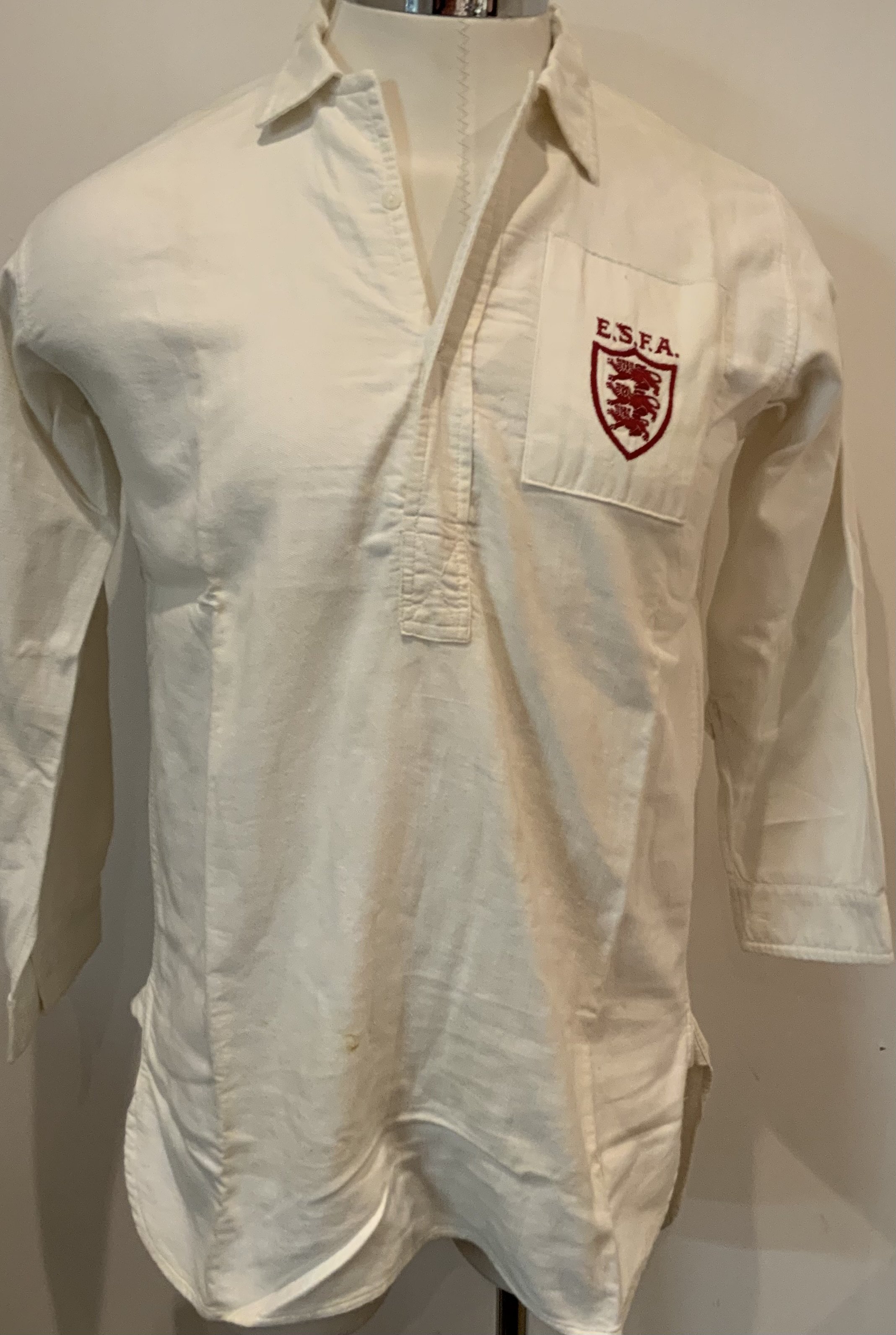 Ron Boyce 1950s England Schools Match Worn Football Shirt. Toomer number 8 long sleeve white shirt in excellent condition worn by Ron Boyce. C/W metal blazer badge.