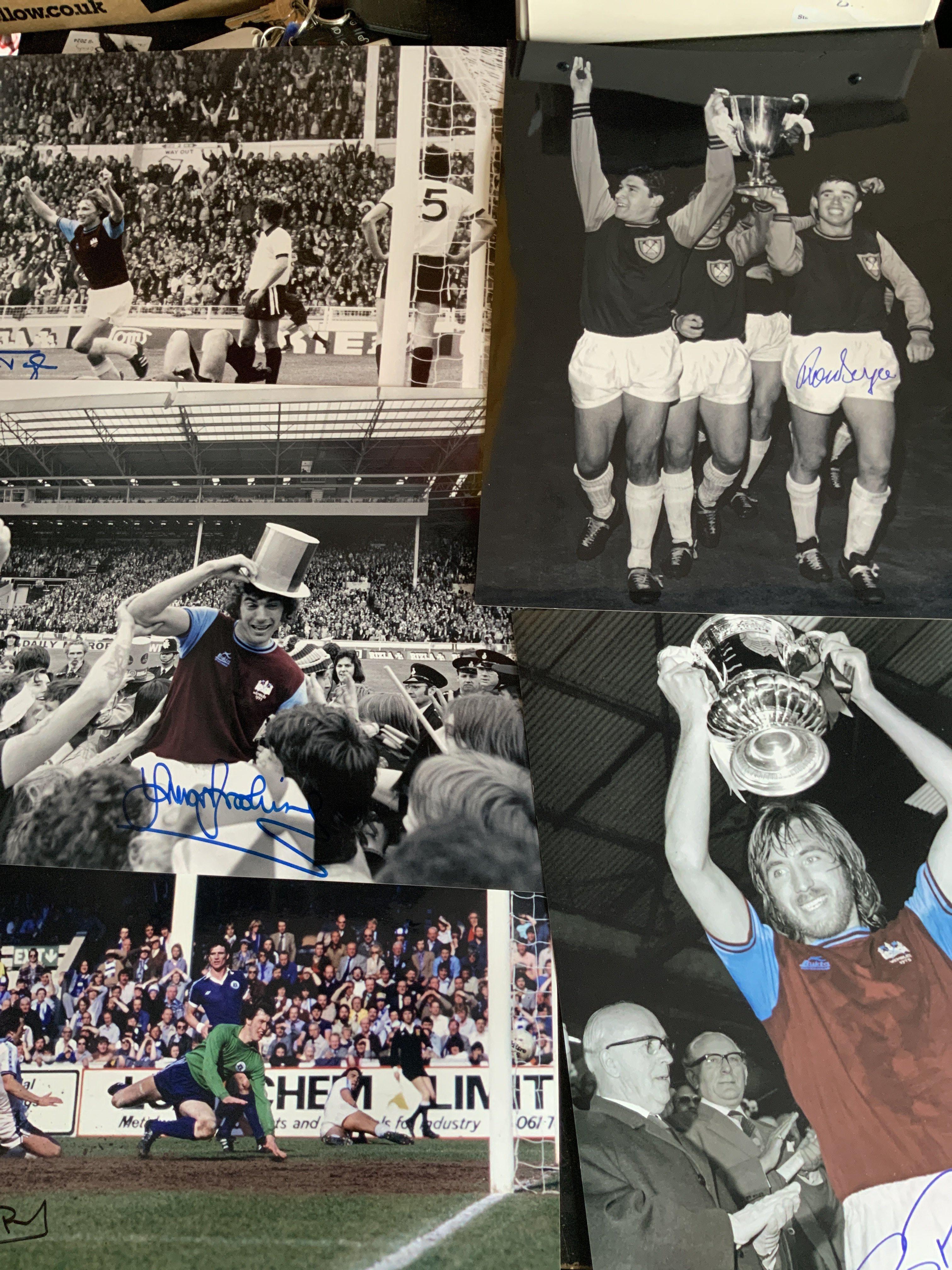West Ham Large Signed Football Photos: 16 x 12 inch photos from famous moments each hand signed. Includes Alan Taylor scoring 1975, Ron Boyce with ECWC 1965, Billy Bonds with FA Cup 1975. (10)