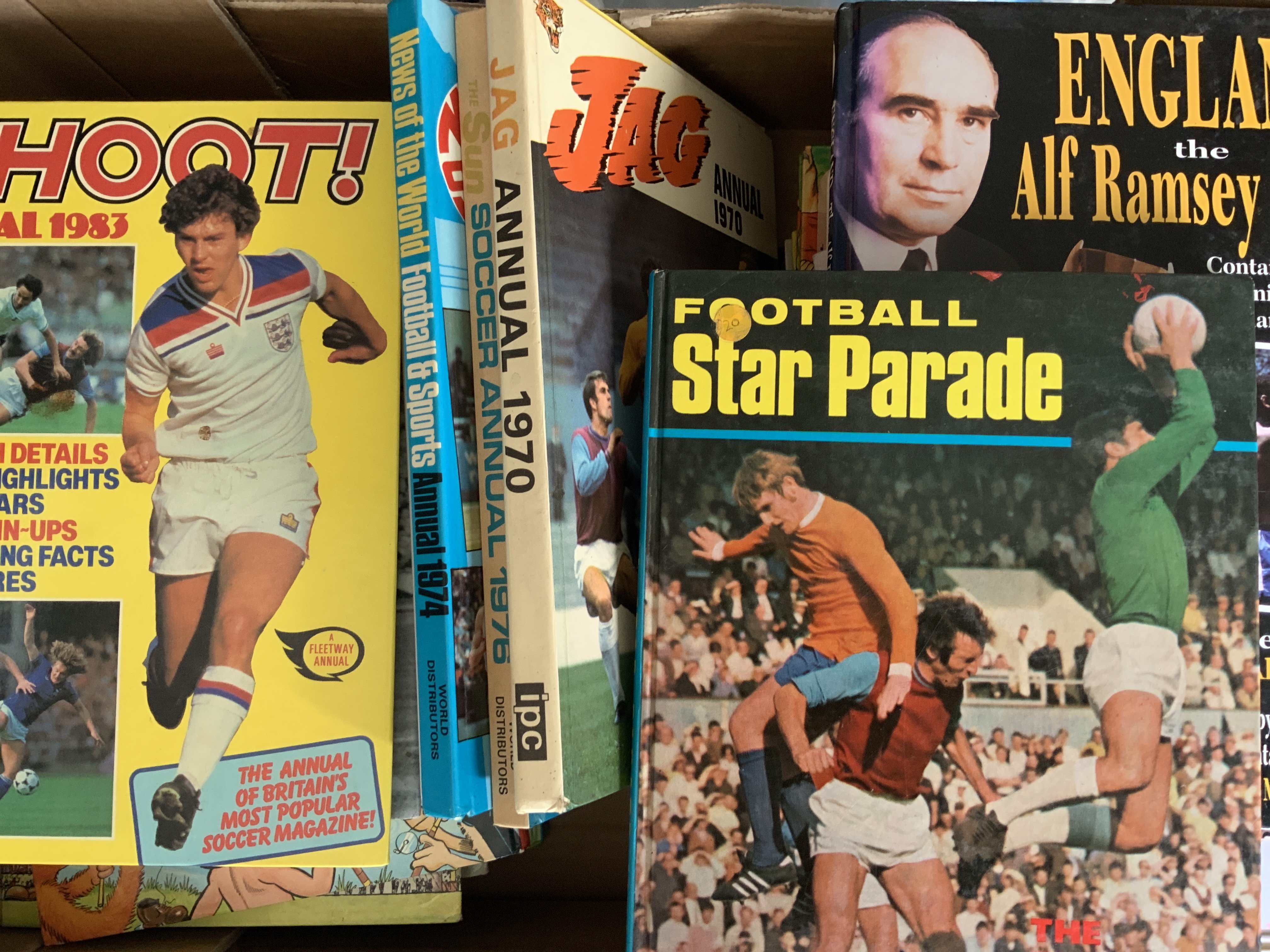 Football Book Collection: Set of 4 Caxtons, Annuals to include Jag, Sun, Star Parade, News of the World, Topical Times, David Colemans, Charles Buchan, Shoot and a few programmes. Some other books included which are not football. 2 boxes with instructions to sell.