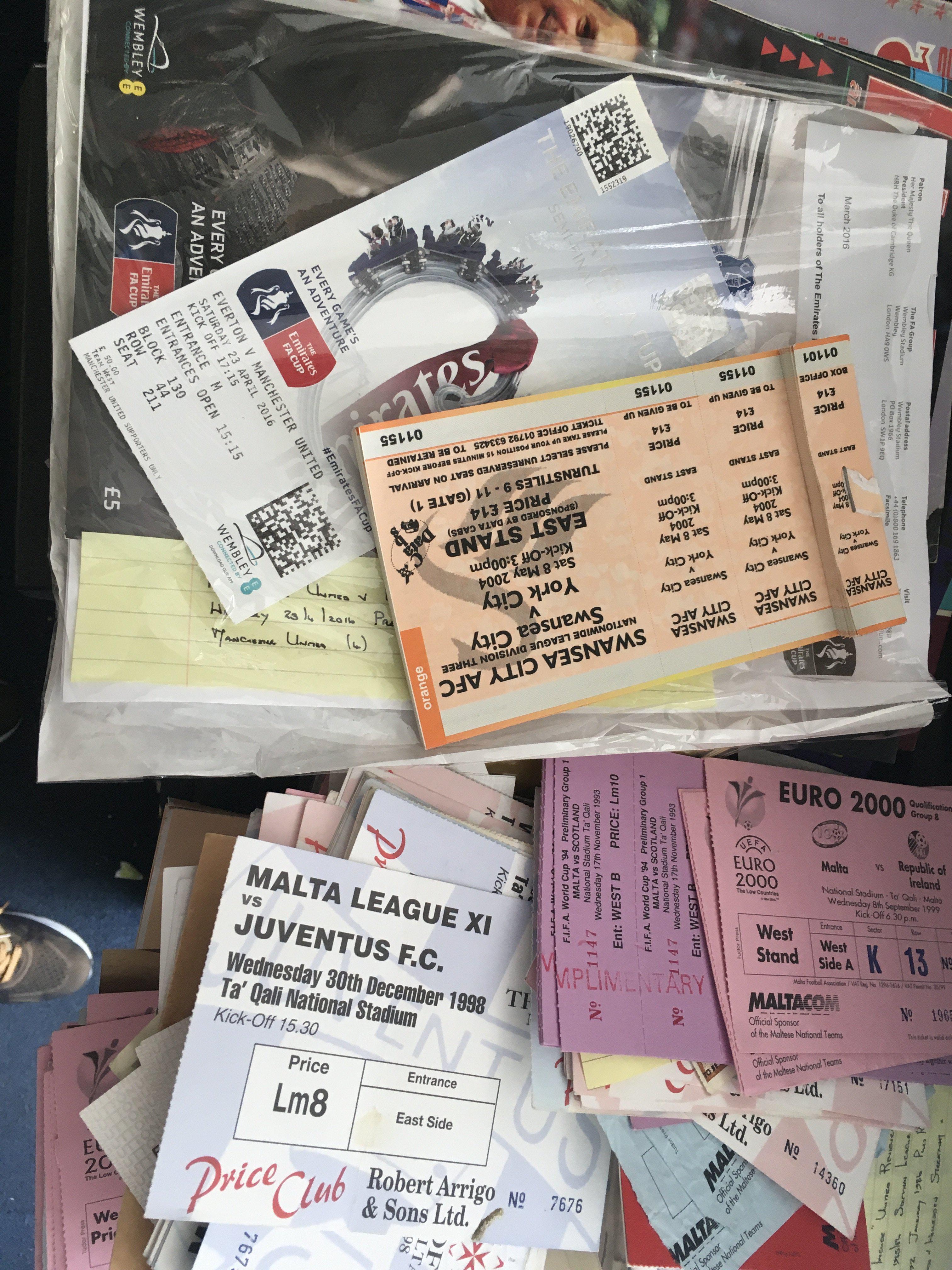 Football Memorabilia Boxes: lots of big match programmes to include 1988 Charity Shield and some Thailand magazines of big matches in England. There are many hundreds of tickets but beware there is heavy duplication. There are hundreds each of 88/89 Sutton v Coventry FA Cup, 1999 Malta v Eire and 2003/2004 Swansea v York. There are some Statisticians magazines and a quantity of West Ham 70/71 handbooks, 1970 World Cup large coin, Marathan medal to include 1985 New York and much more. 2 large boxes with instructions to sell.