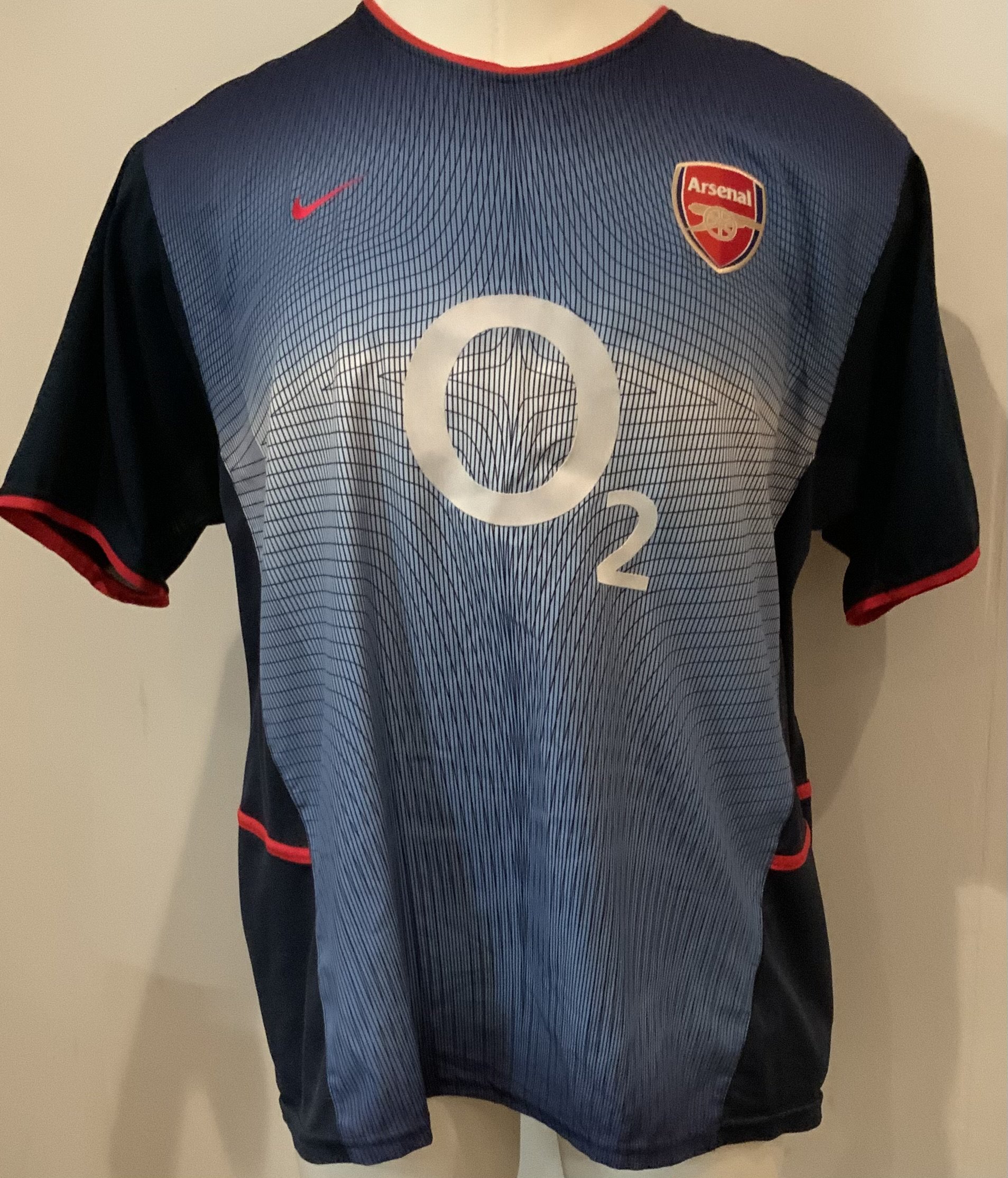 Arsenal 02 - 04 Away Football Shirt: Short sleeve blue replica O2 in good condition. Size XL.