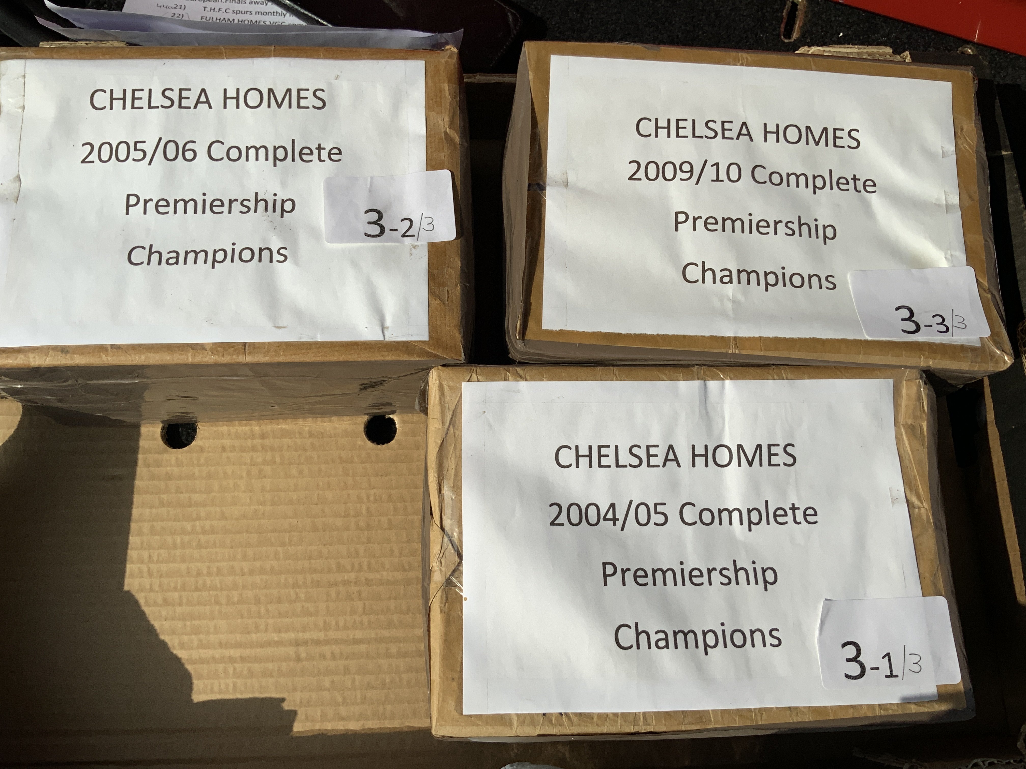 Chelsea Premier League Champions Complete Programme Sets: Sealed packets never opened of home programmes from 2004/2005 2005/2006 and 2009/2010. (3 sets)